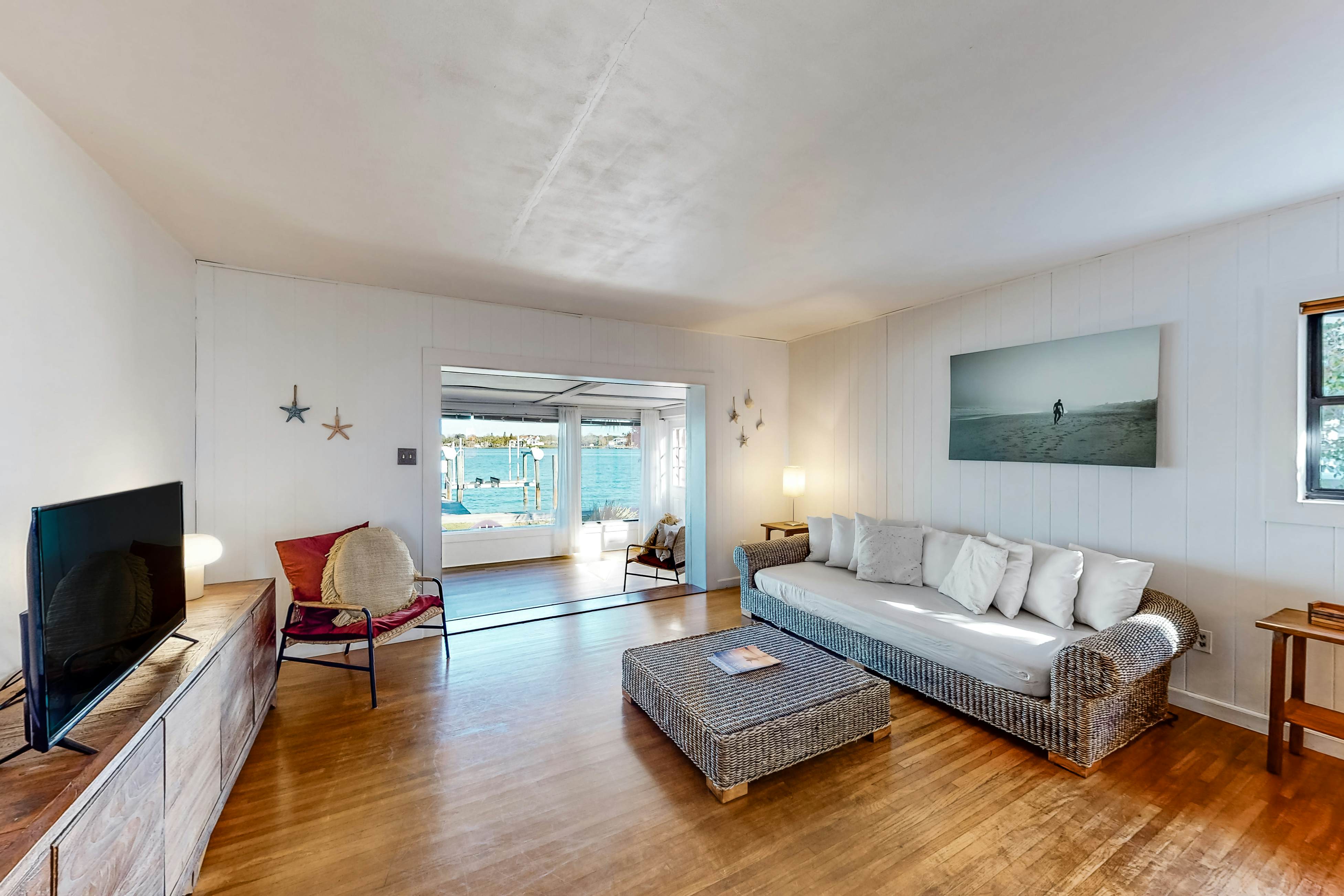 Waterfront home with deck, garden, WiFi & central AC - dog-friendly