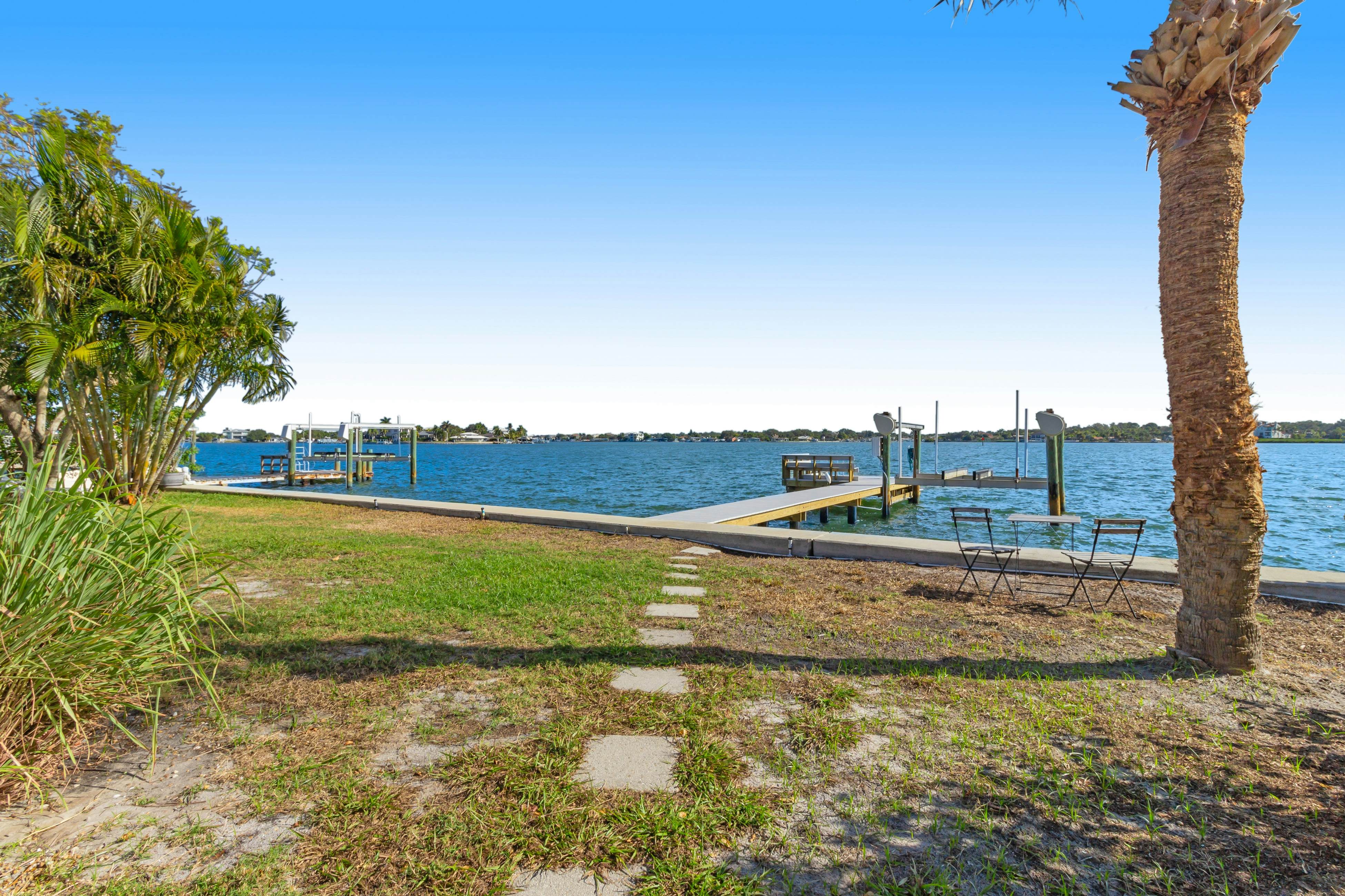 Waterfront home with deck, garden, WiFi & central AC - dog-friendly