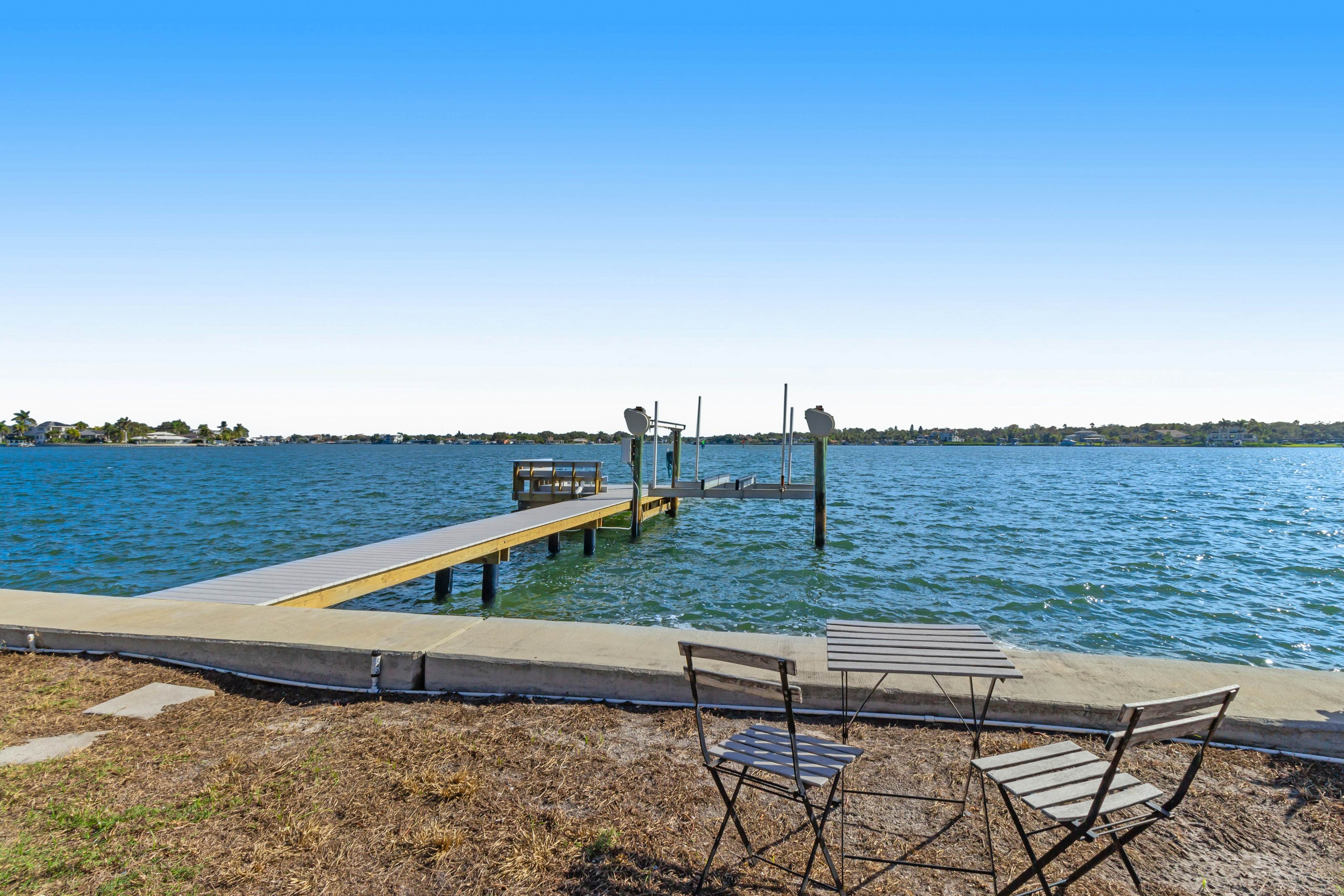 Waterfront home with deck, garden, WiFi & central AC - dog-friendly