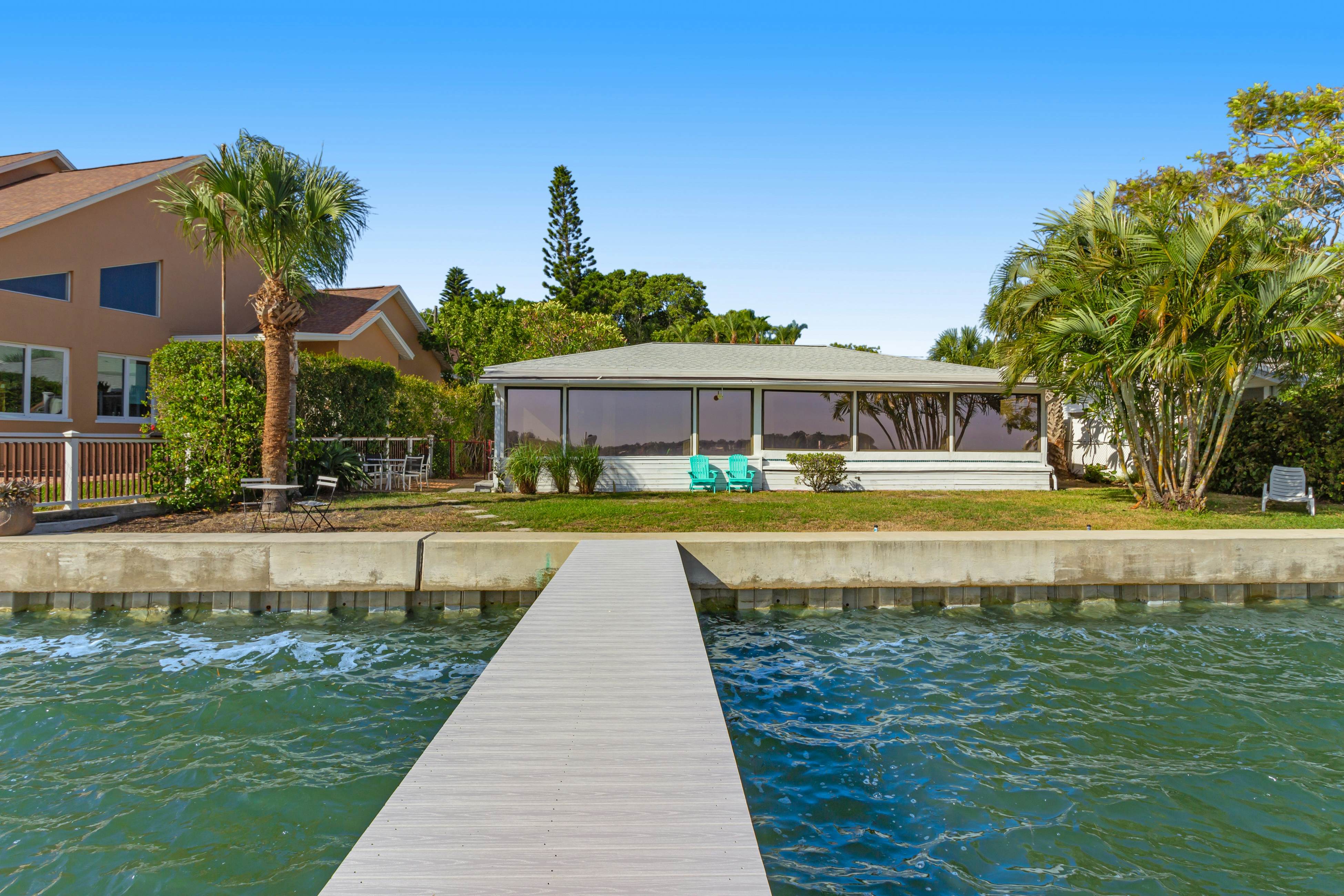 Waterfront home with deck, garden, WiFi & central AC - dog-friendly