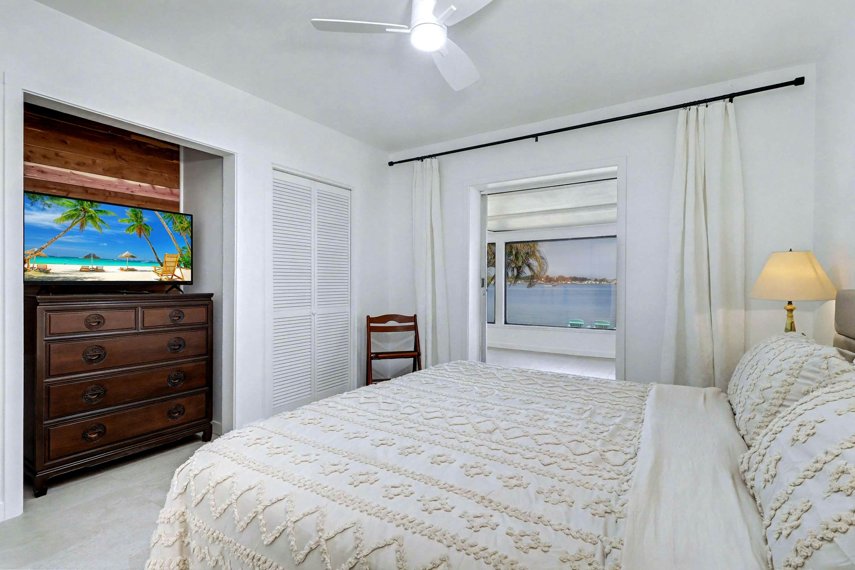 Waterfront home with deck, garden, WiFi & central AC - dog-friendly