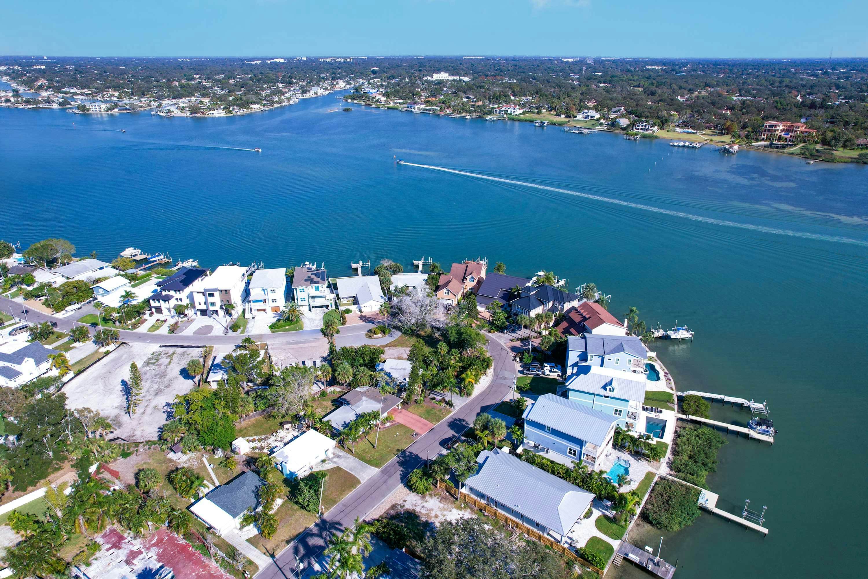 Waterfront home with deck, garden, WiFi & central AC - dog-friendly