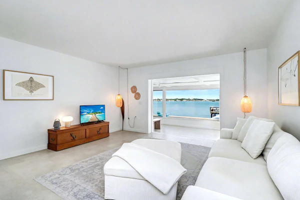 Waterfront home with deck garden WiFi and central AC dog friendly