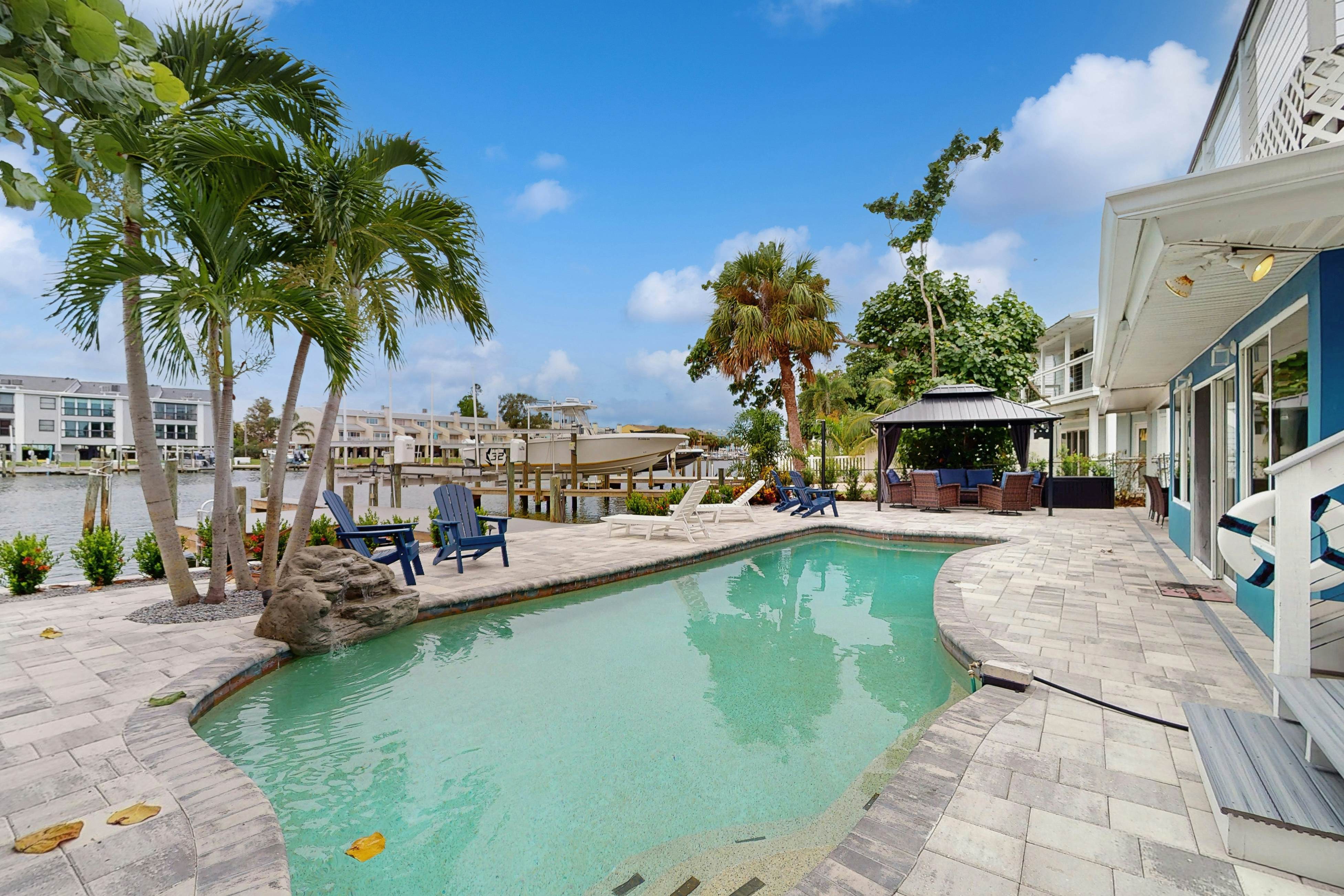 Waterfront home with private pool, deck & patio - 1/2 mile to the beach