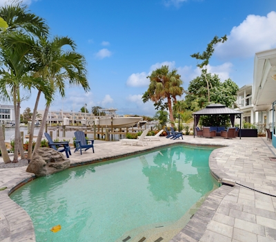 Waterfront home with private pool deck and patio 1 2 mile to the beach