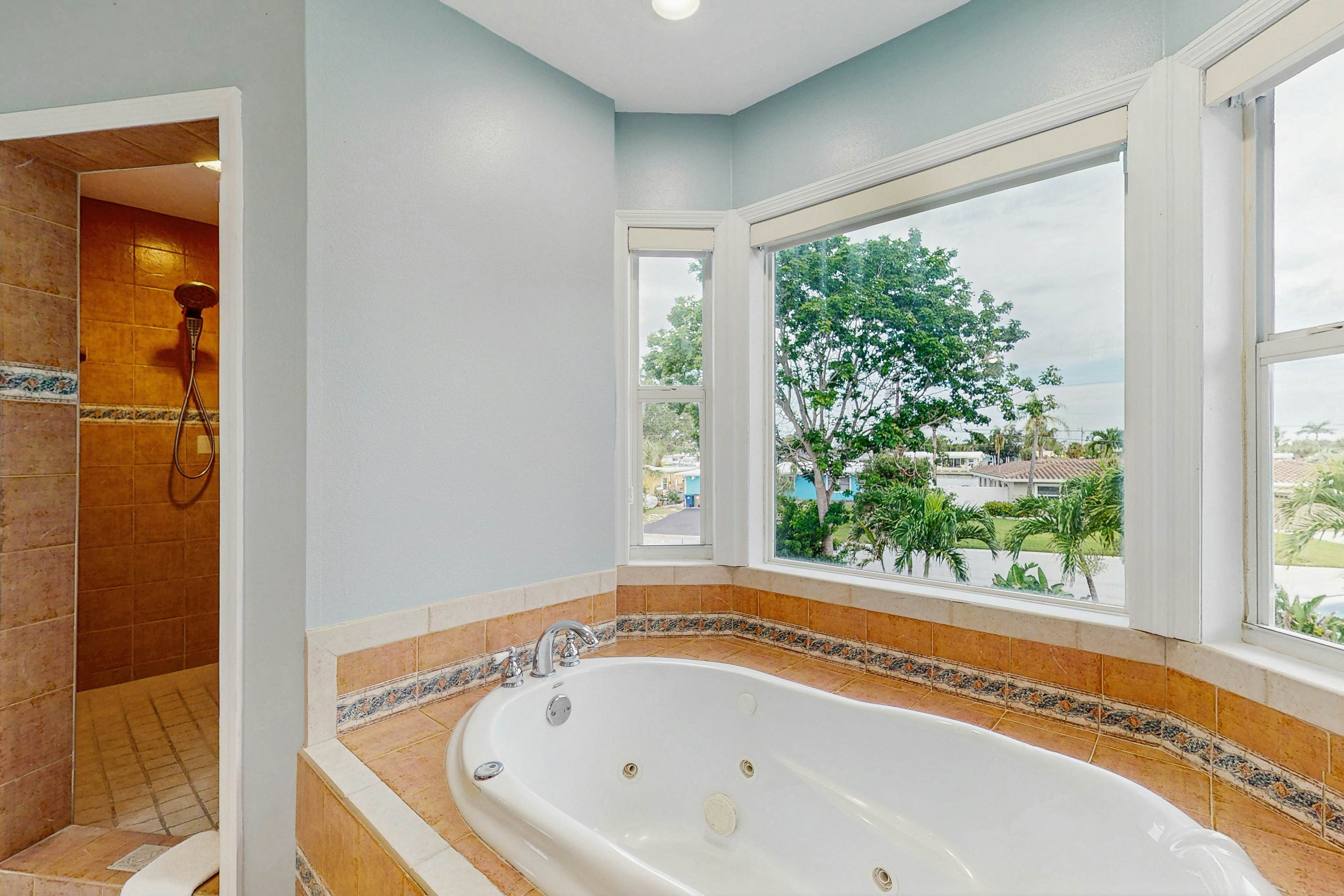 Waterfront home with private pool, deck & patio - 1/2 mile to the beach