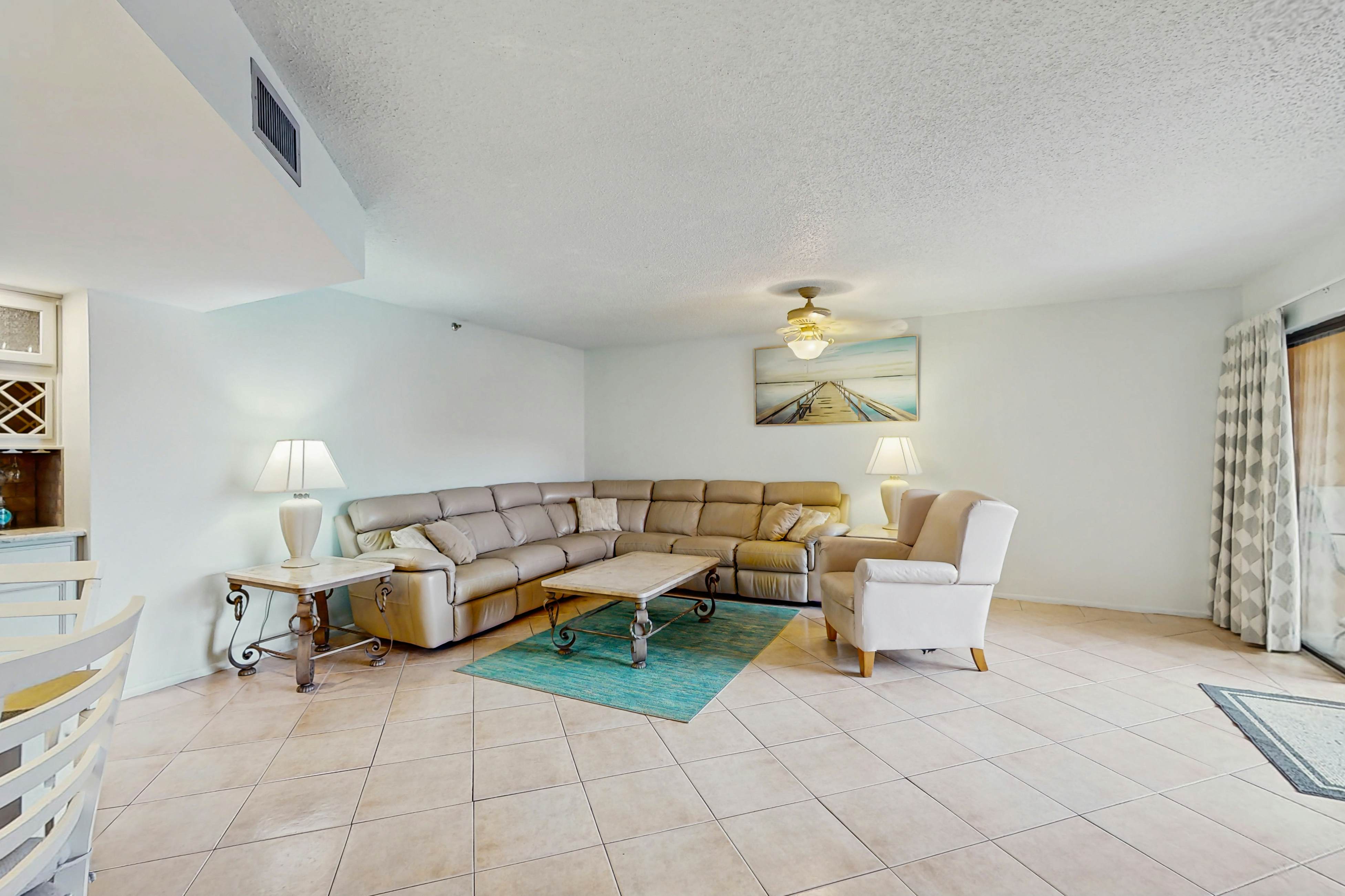 Waterfront condo with updated amenities, heated pool, hot tub, & tennis