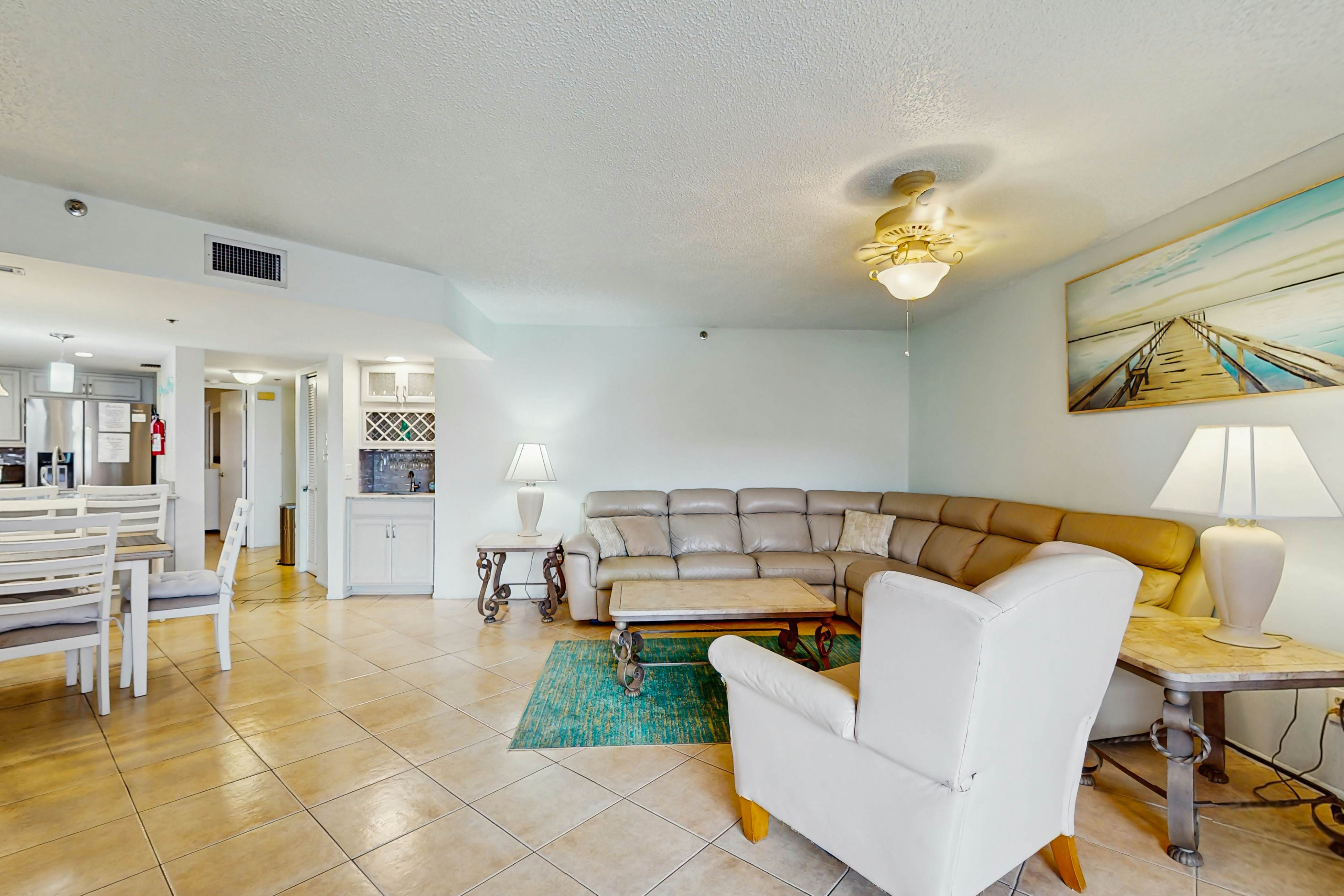 Waterfront condo with updated amenities, heated pool, hot tub, & tennis