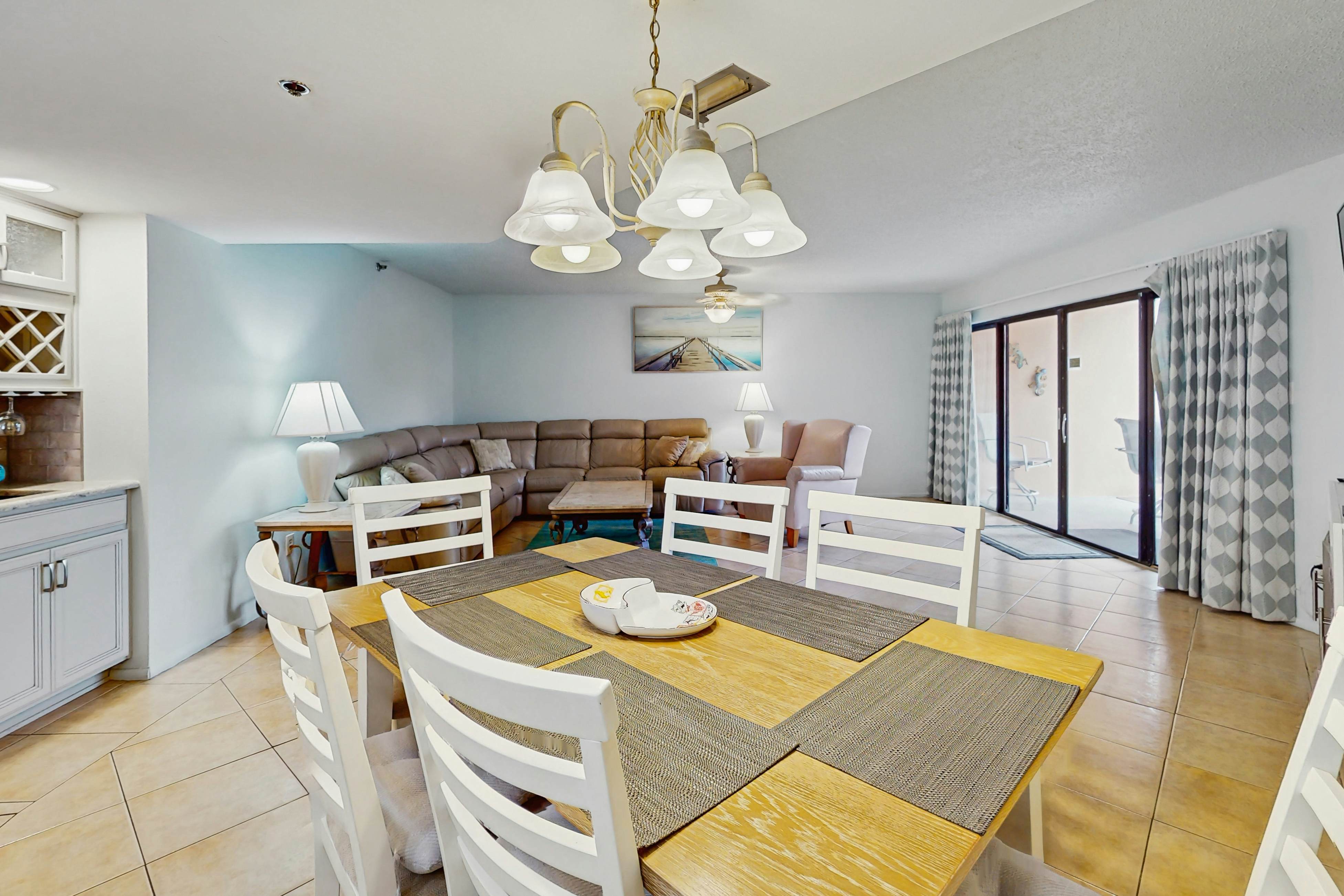 Waterfront condo with updated amenities, heated pool, hot tub, & tennis