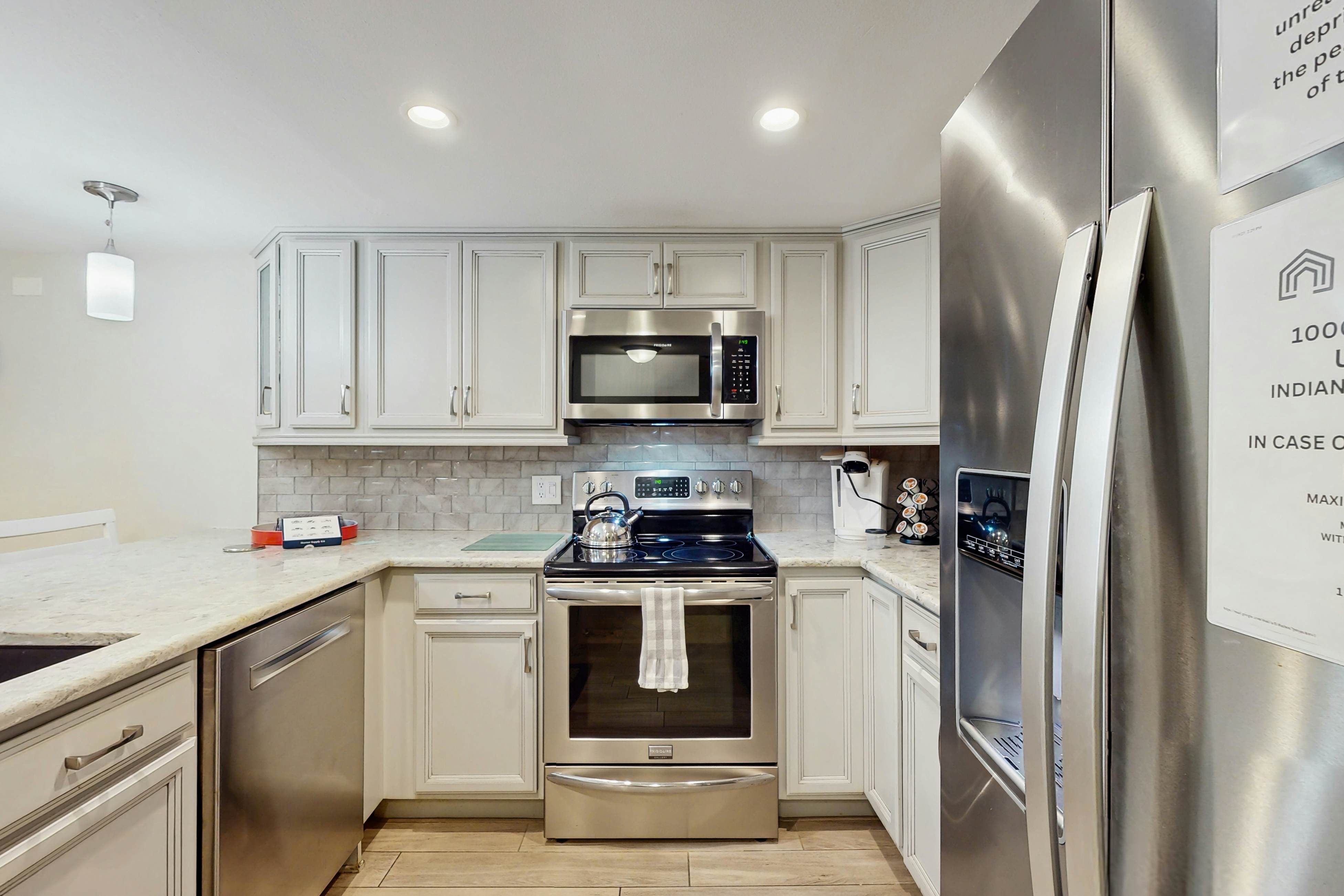 Waterfront condo with updated amenities, heated pool, hot tub, & tennis