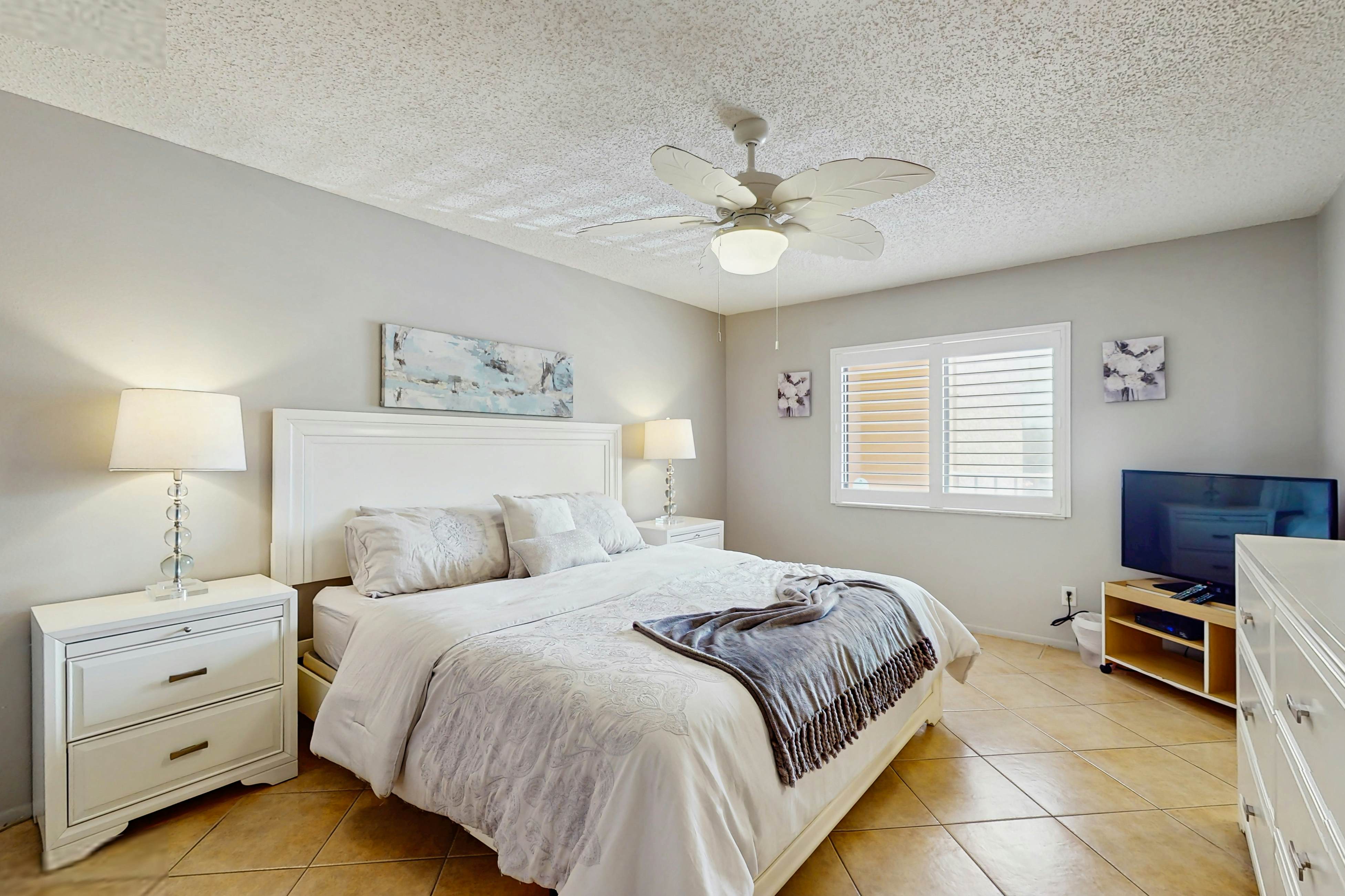 Waterfront condo with updated amenities, heated pool, hot tub, & tennis