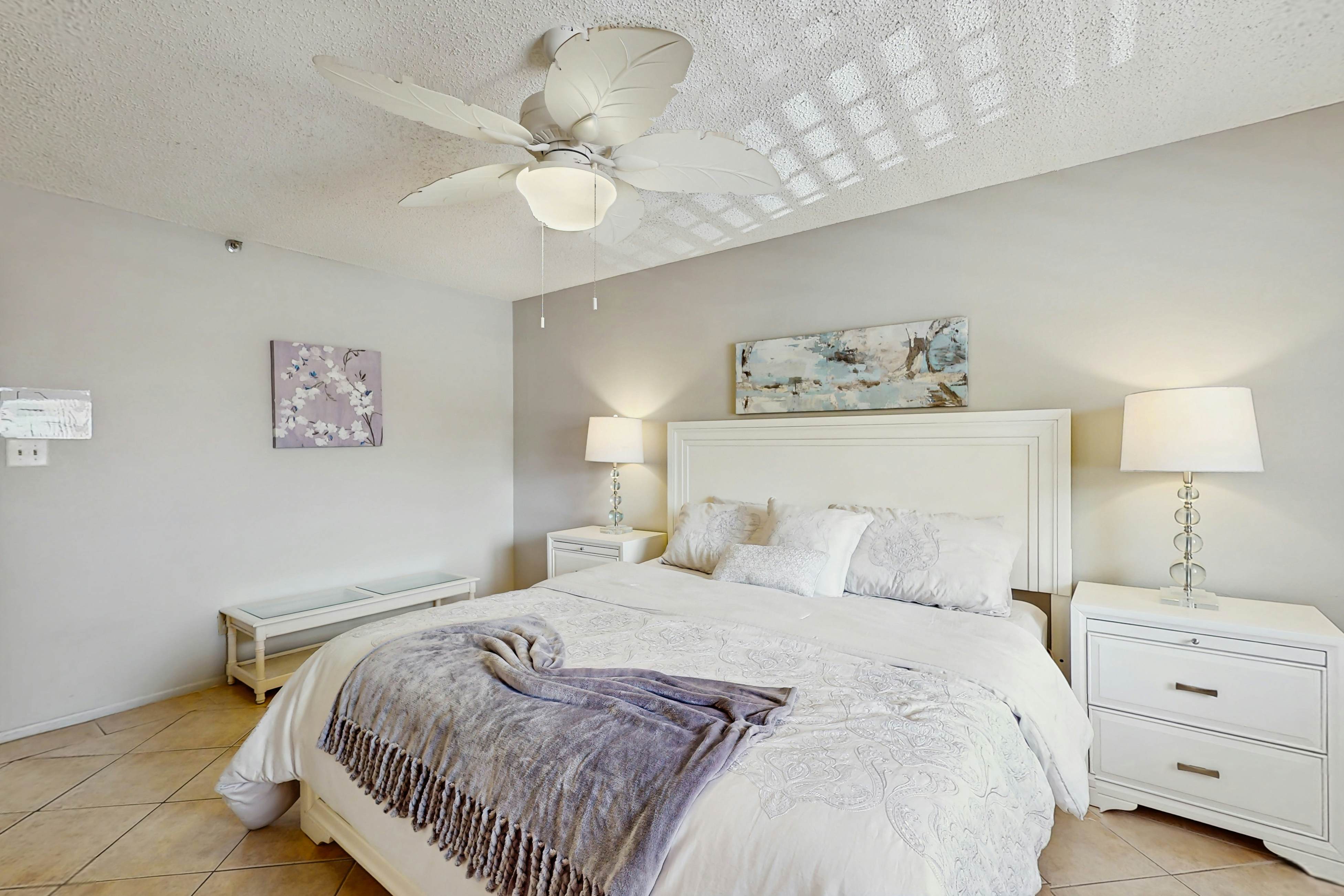 Waterfront condo with updated amenities, heated pool, hot tub, & tennis