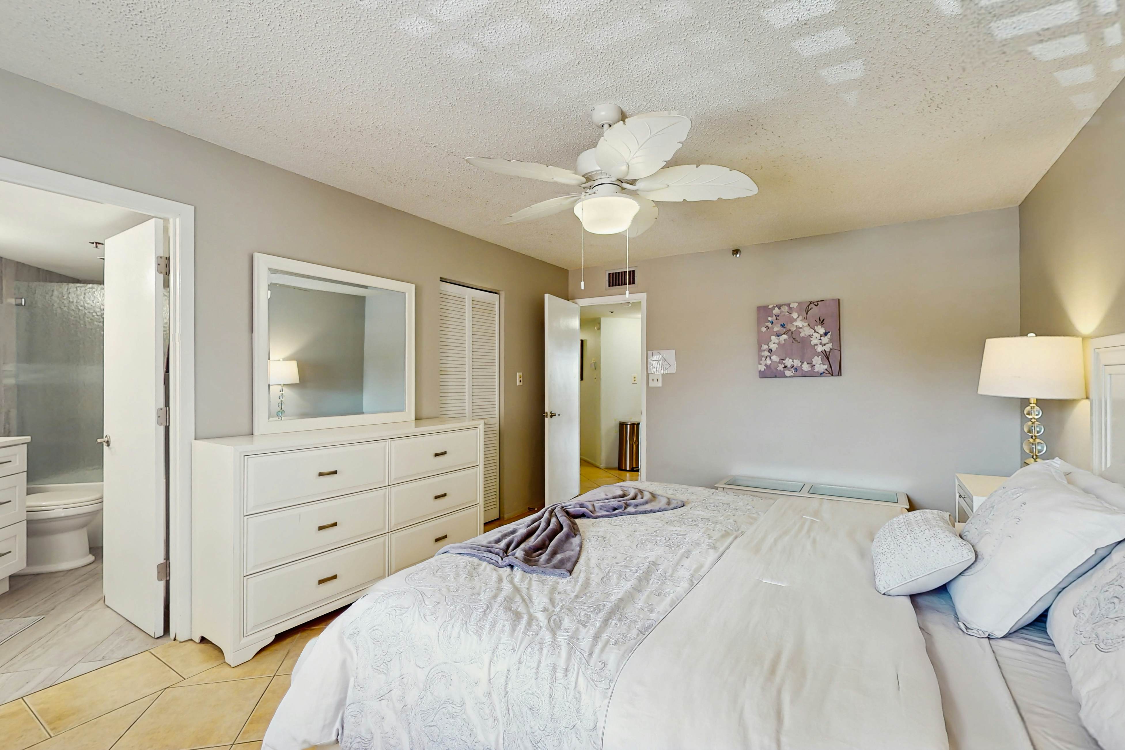 Waterfront condo with updated amenities, heated pool, hot tub, & tennis