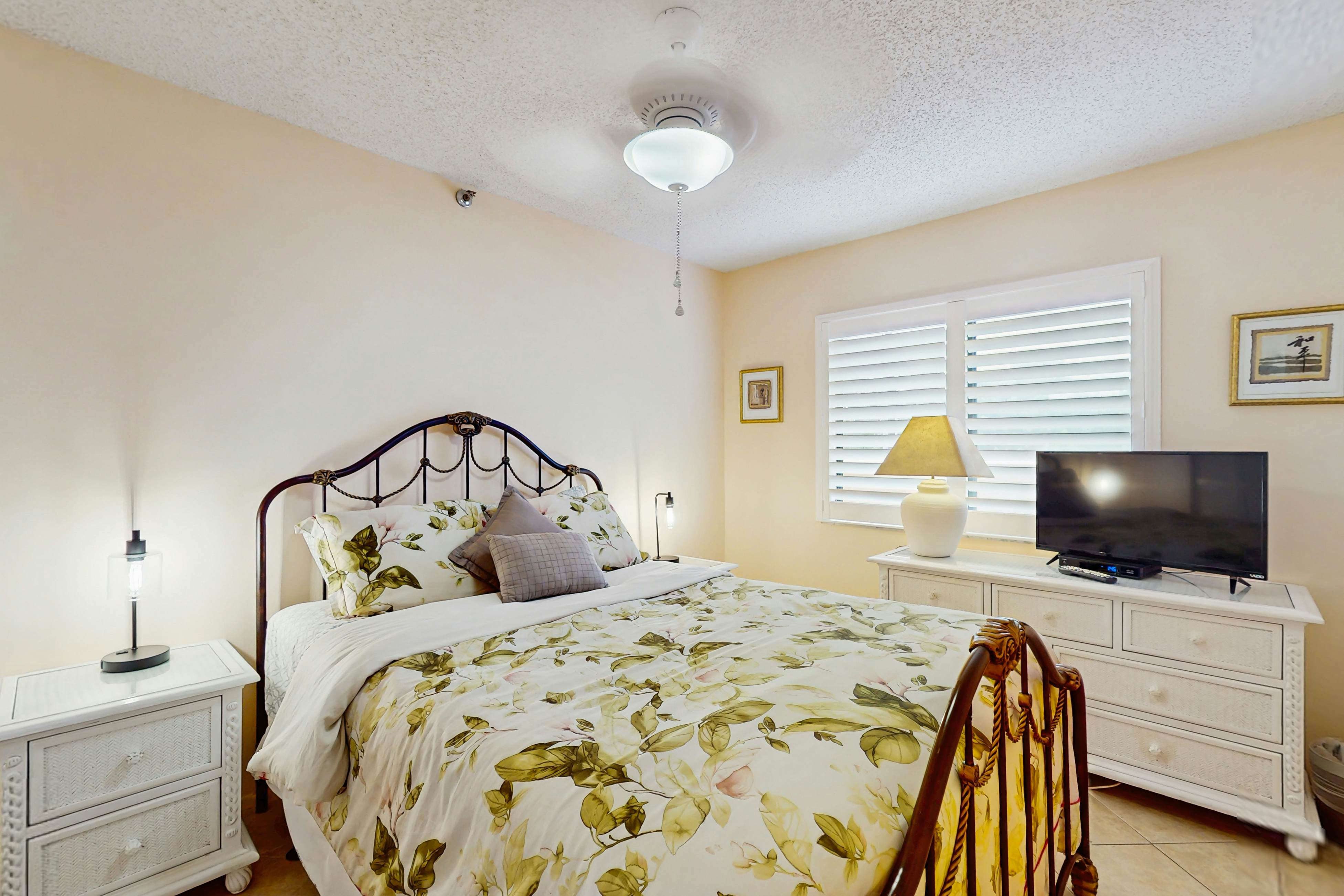 Waterfront condo with updated amenities, heated pool, hot tub, & tennis