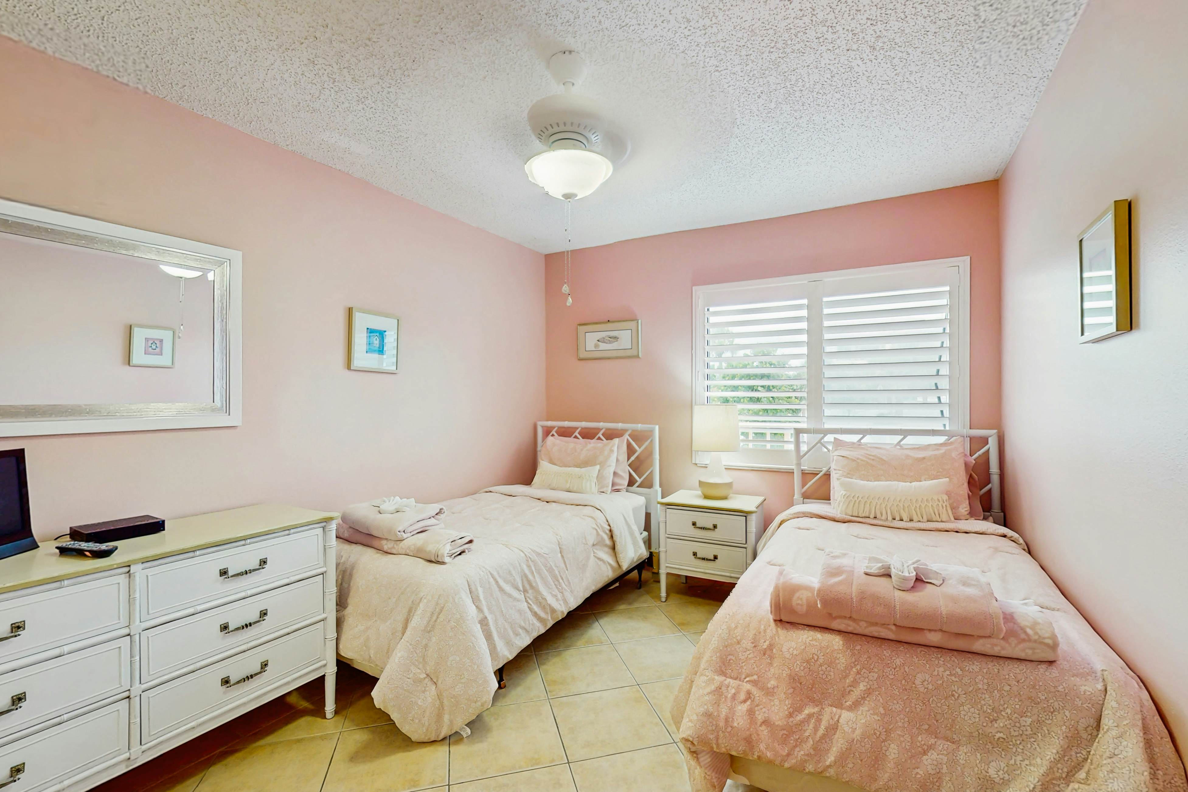 Waterfront condo with updated amenities, heated pool, hot tub, & tennis