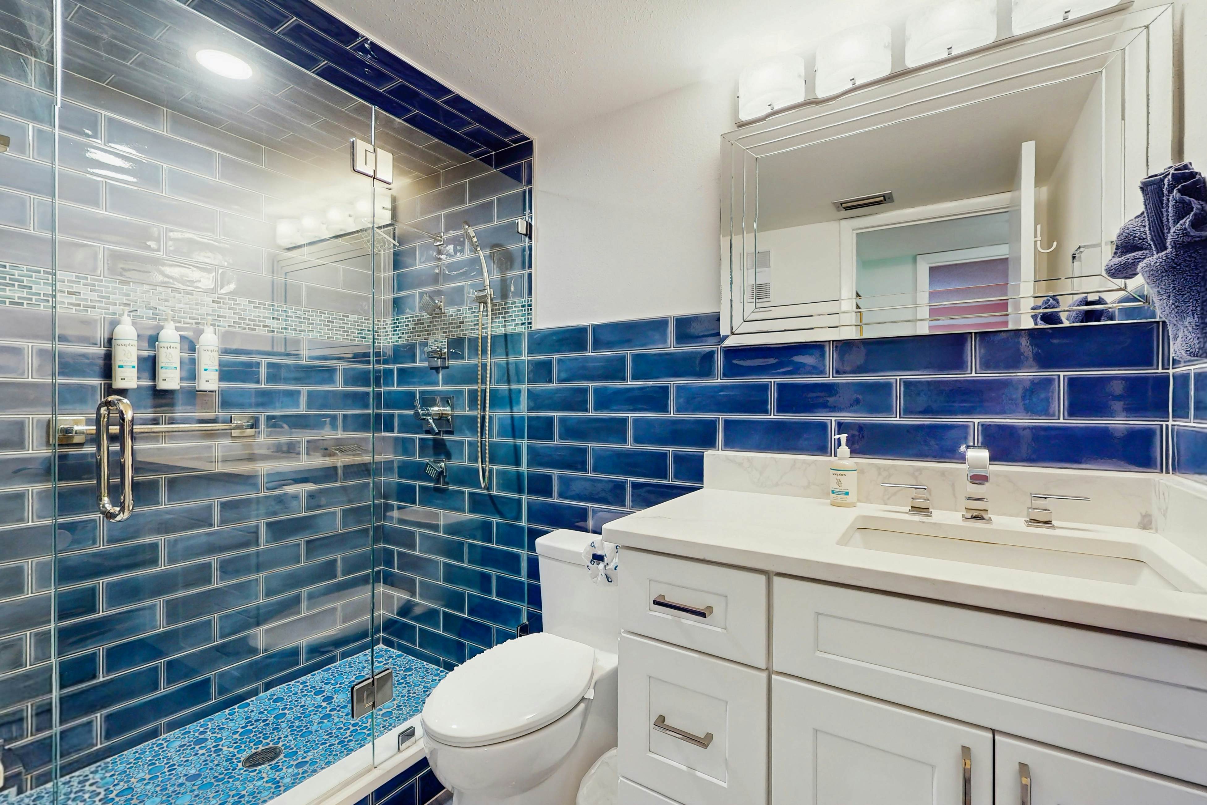 Waterfront condo with updated amenities, heated pool, hot tub, & tennis