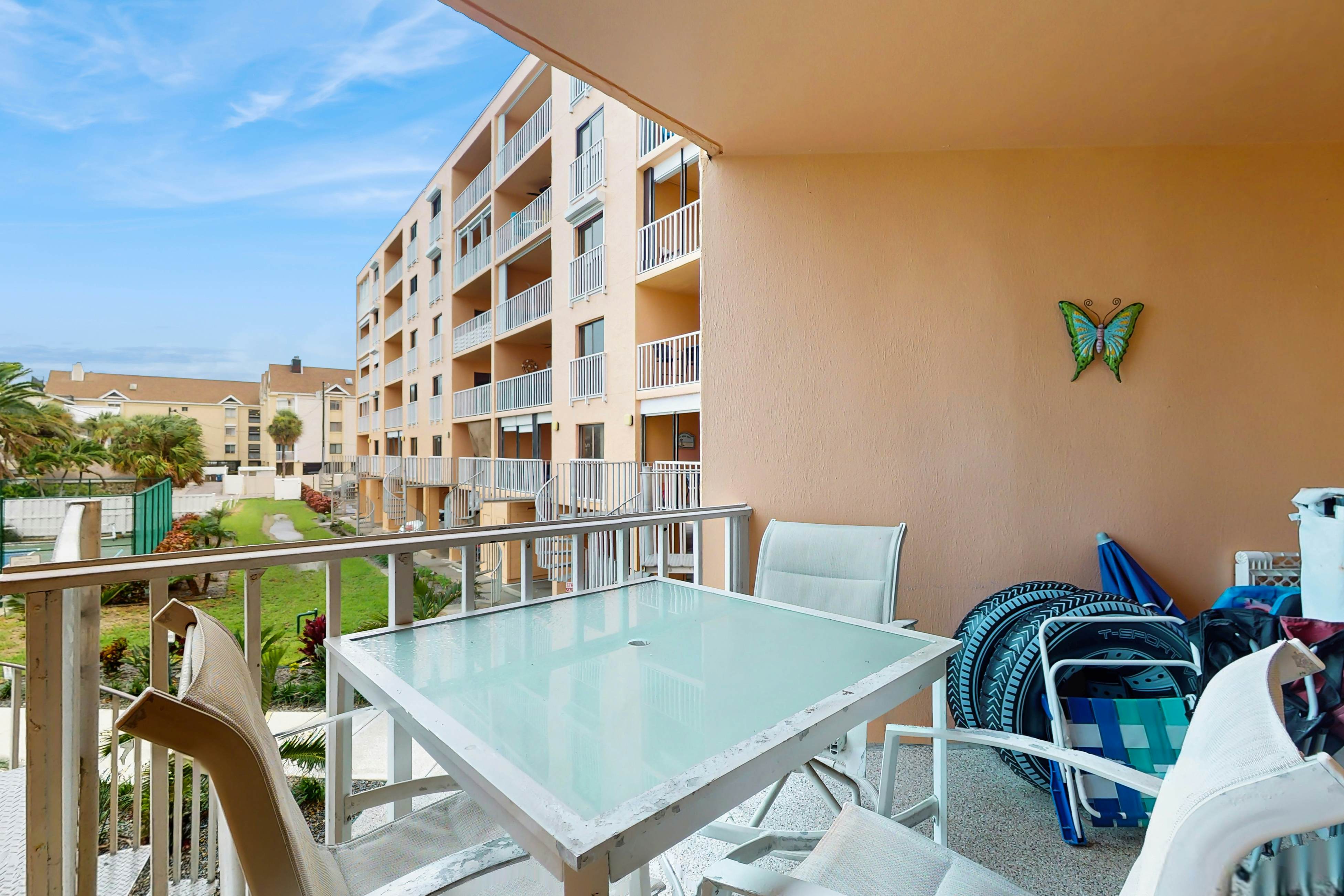 Waterfront condo with updated amenities, heated pool, hot tub, & tennis