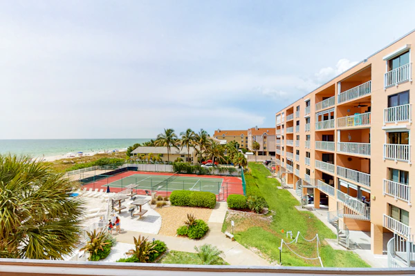 Waterfront condo with pool hot tub tennis and beach access