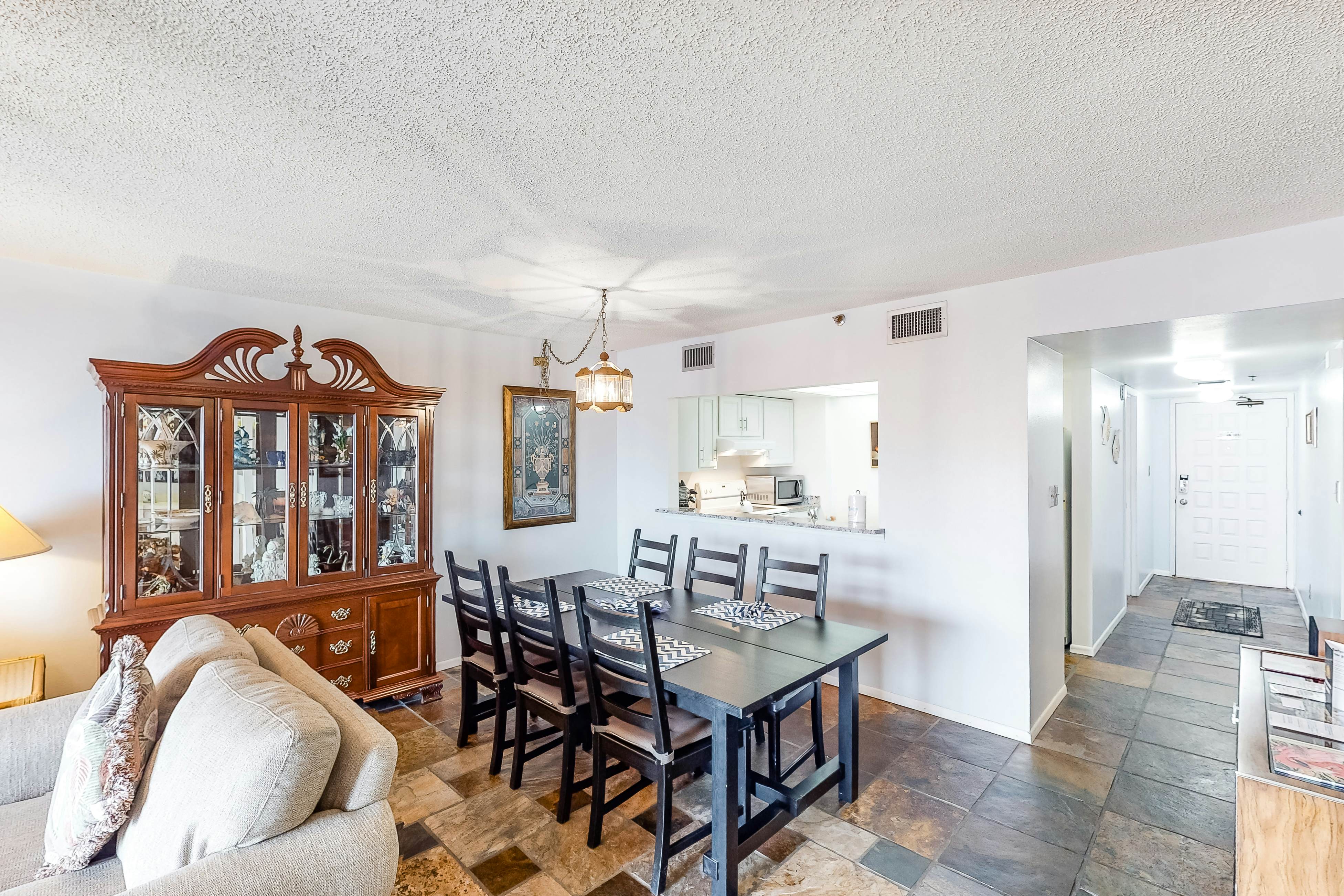 Waterfront condo with pool, hot tub, tennis, & beach access