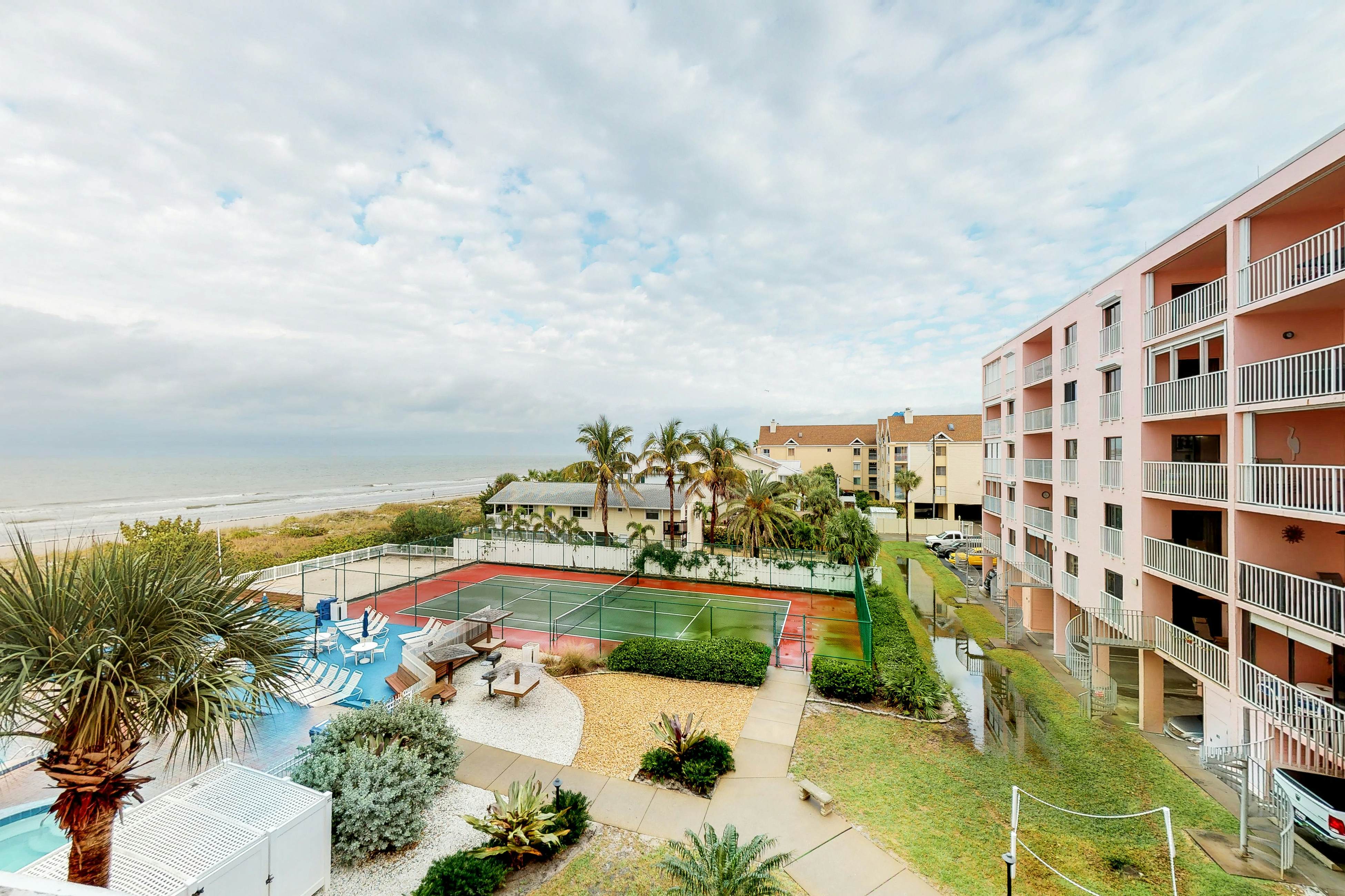 Waterfront condo with pool, hot tub, tennis, & beach access