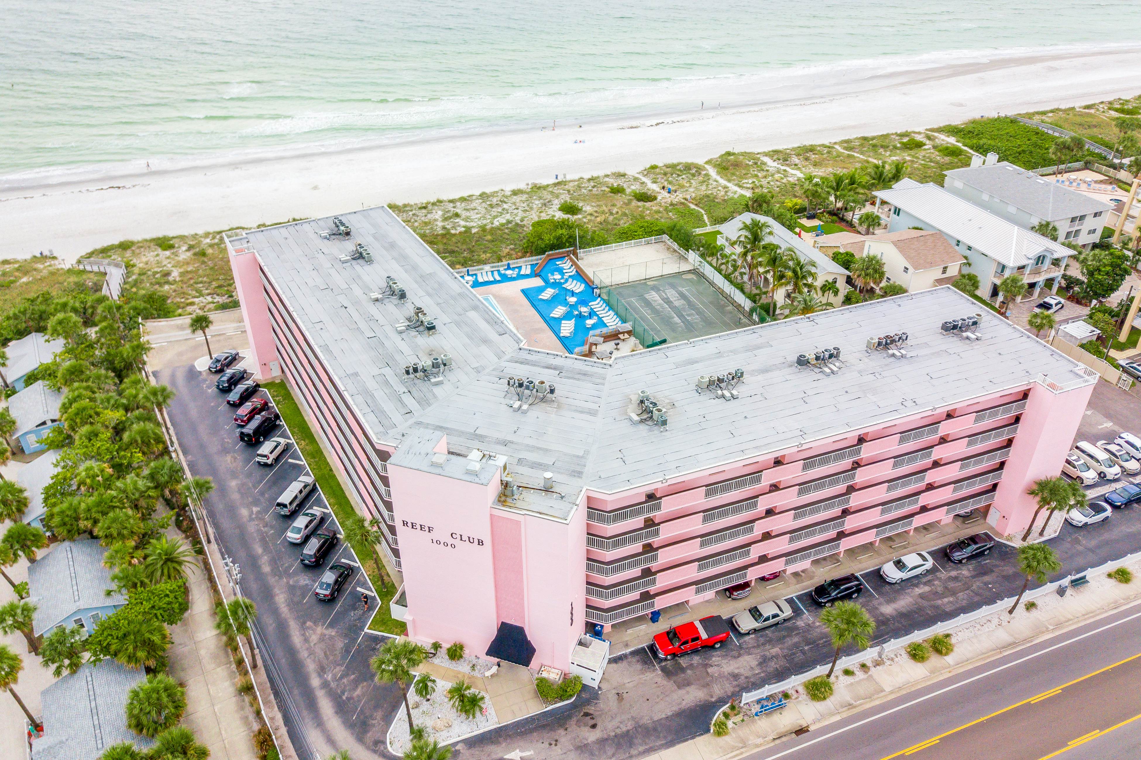 Waterfront condo with pool, hot tub, tennis, & beach access