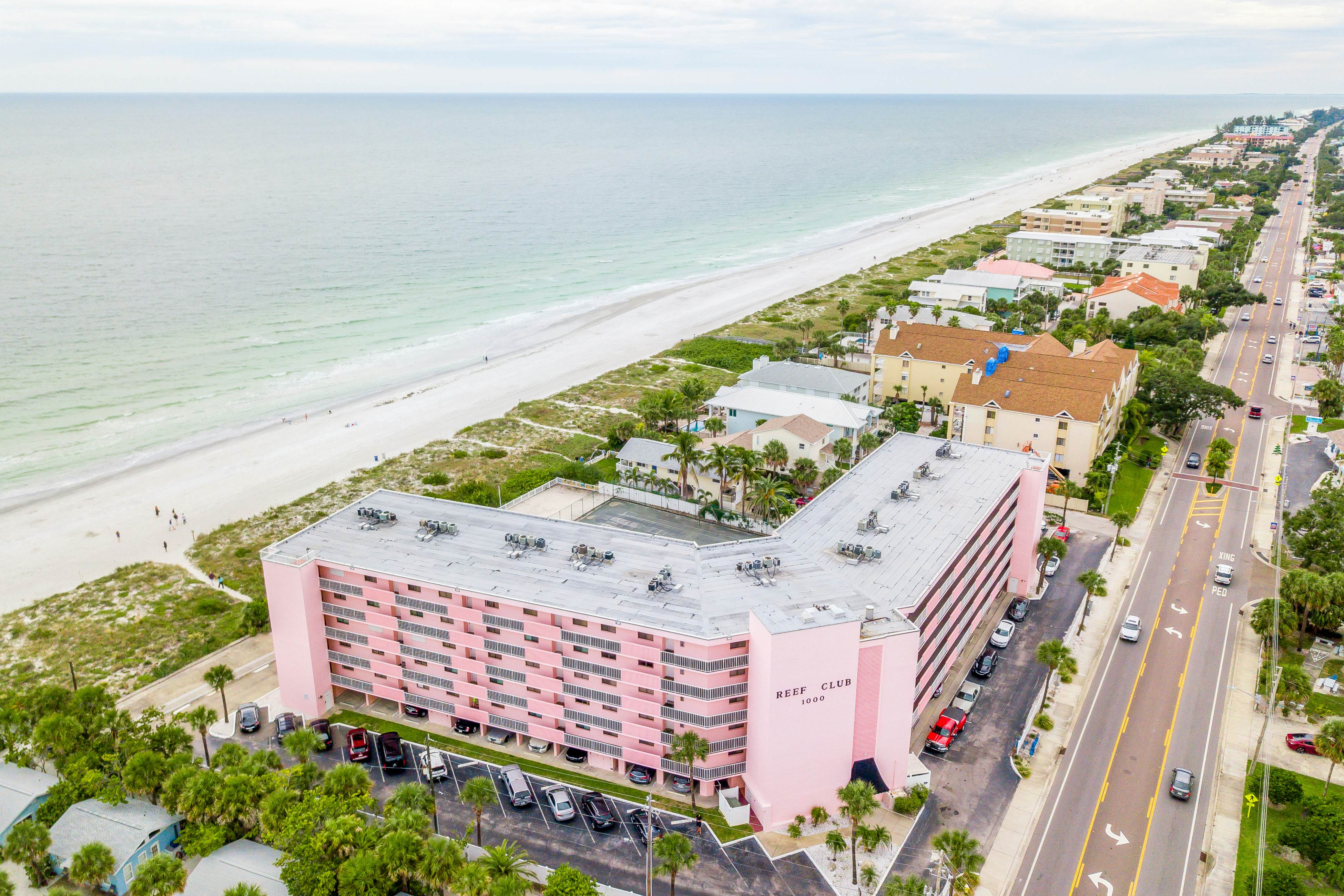 Waterfront condo with pool, hot tub, tennis, & beach access