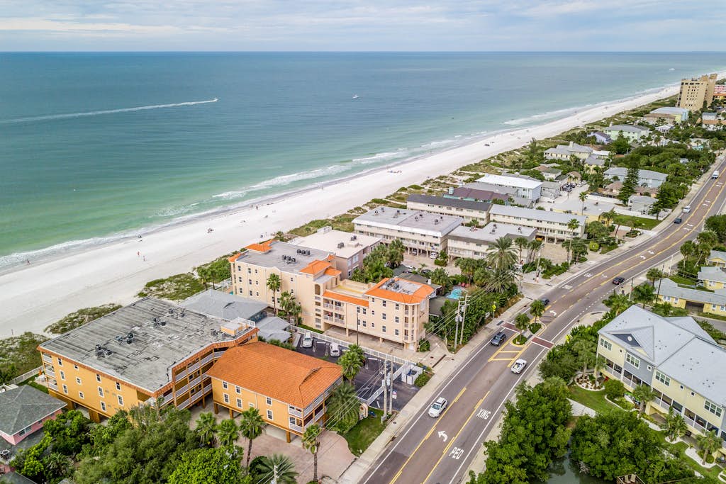 Beautiful oceanfront condo on the beach with pool and WiFi walk to restaurants