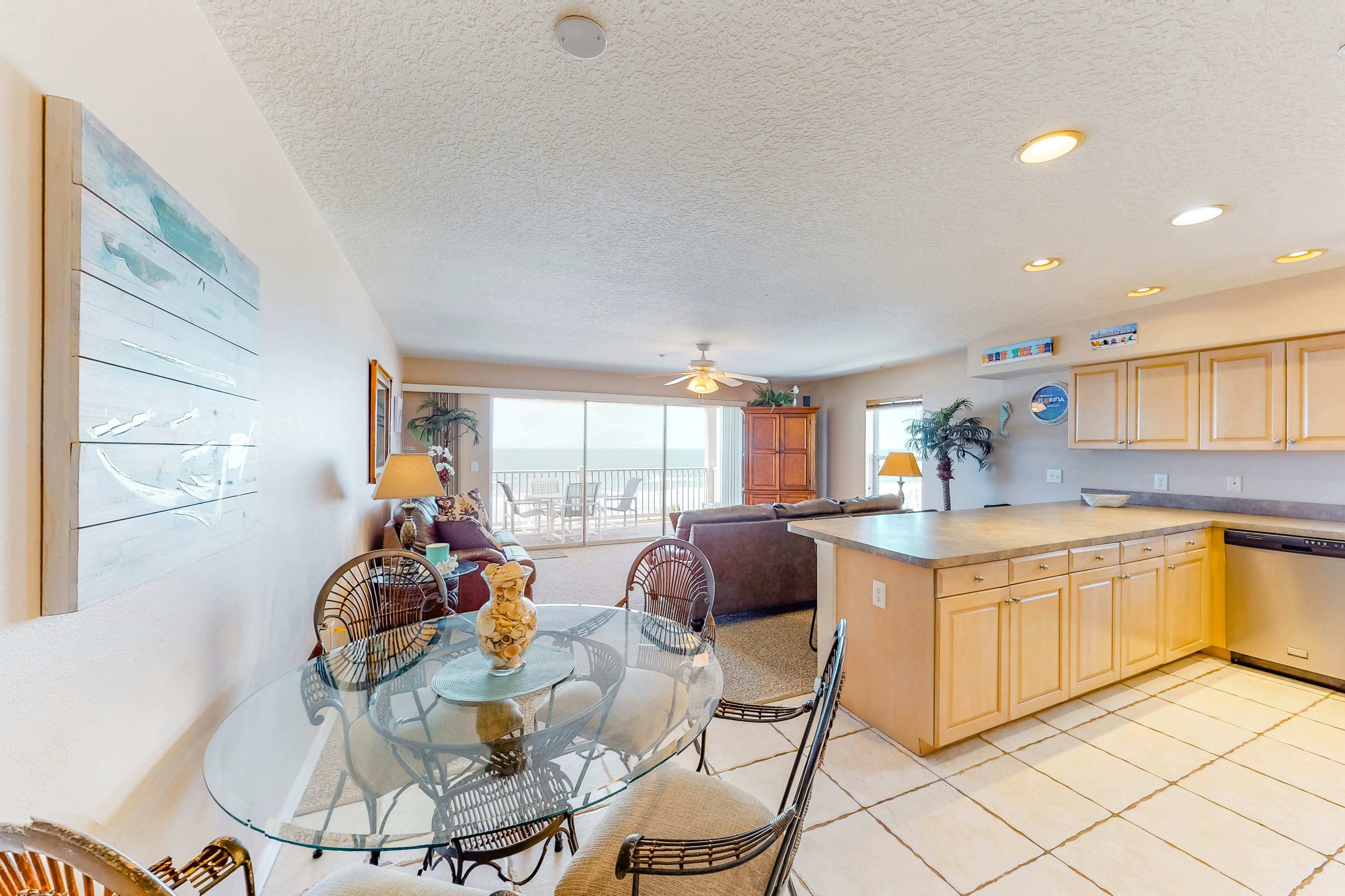 Beautiful oceanfront condo on the beach with pool & WiFi, walk to restaurants