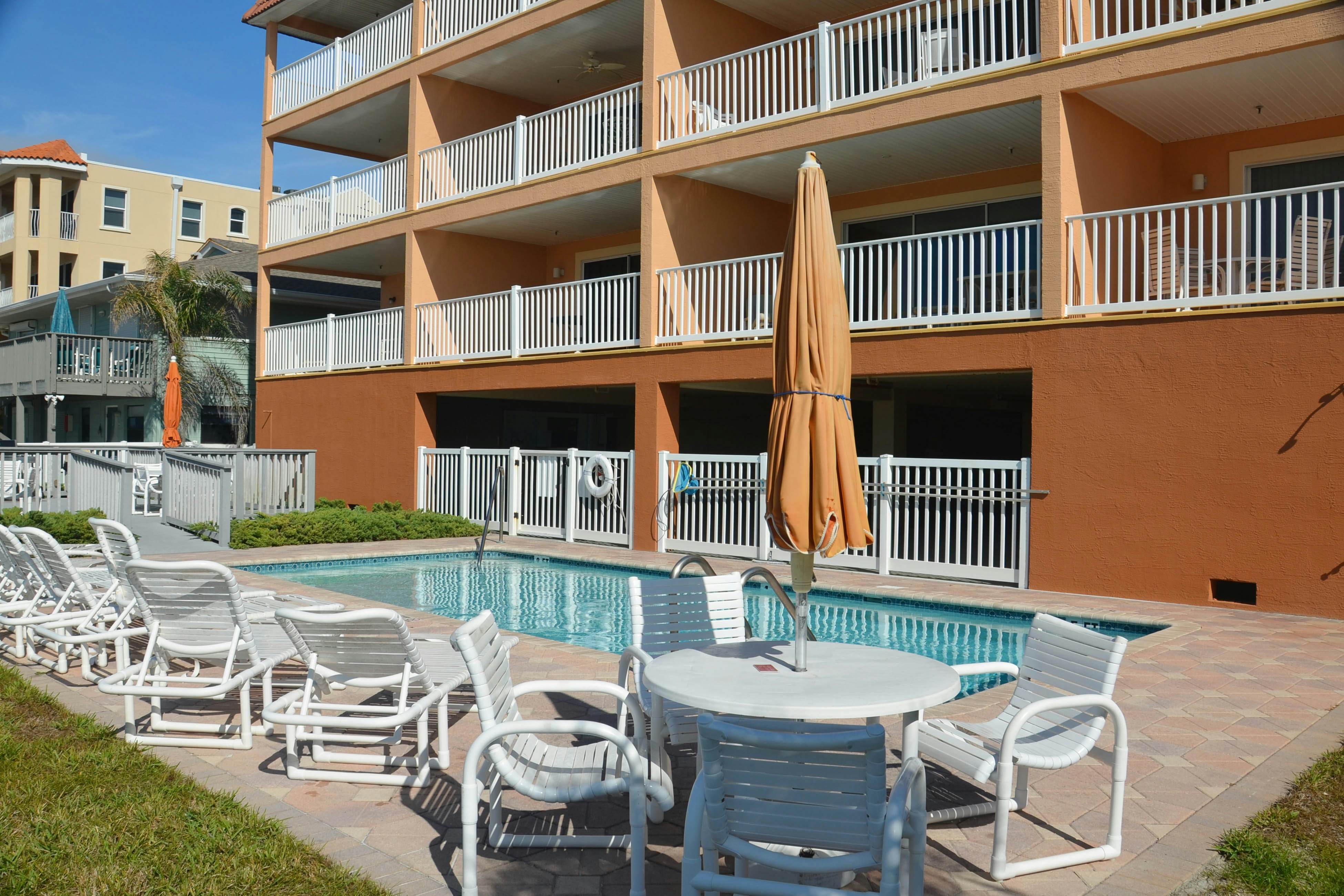 Beautiful oceanfront condo on the beach with pool & WiFi, walk to restaurants