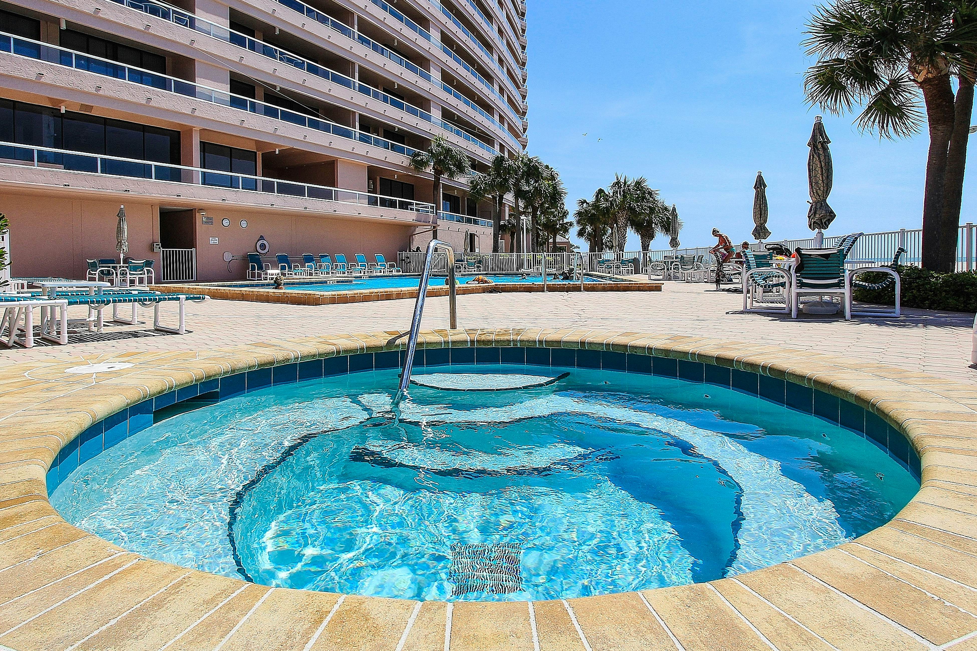 Vibrant, ocean-view condo with hot tub, tennis court, pool, W/D, balcony & grill