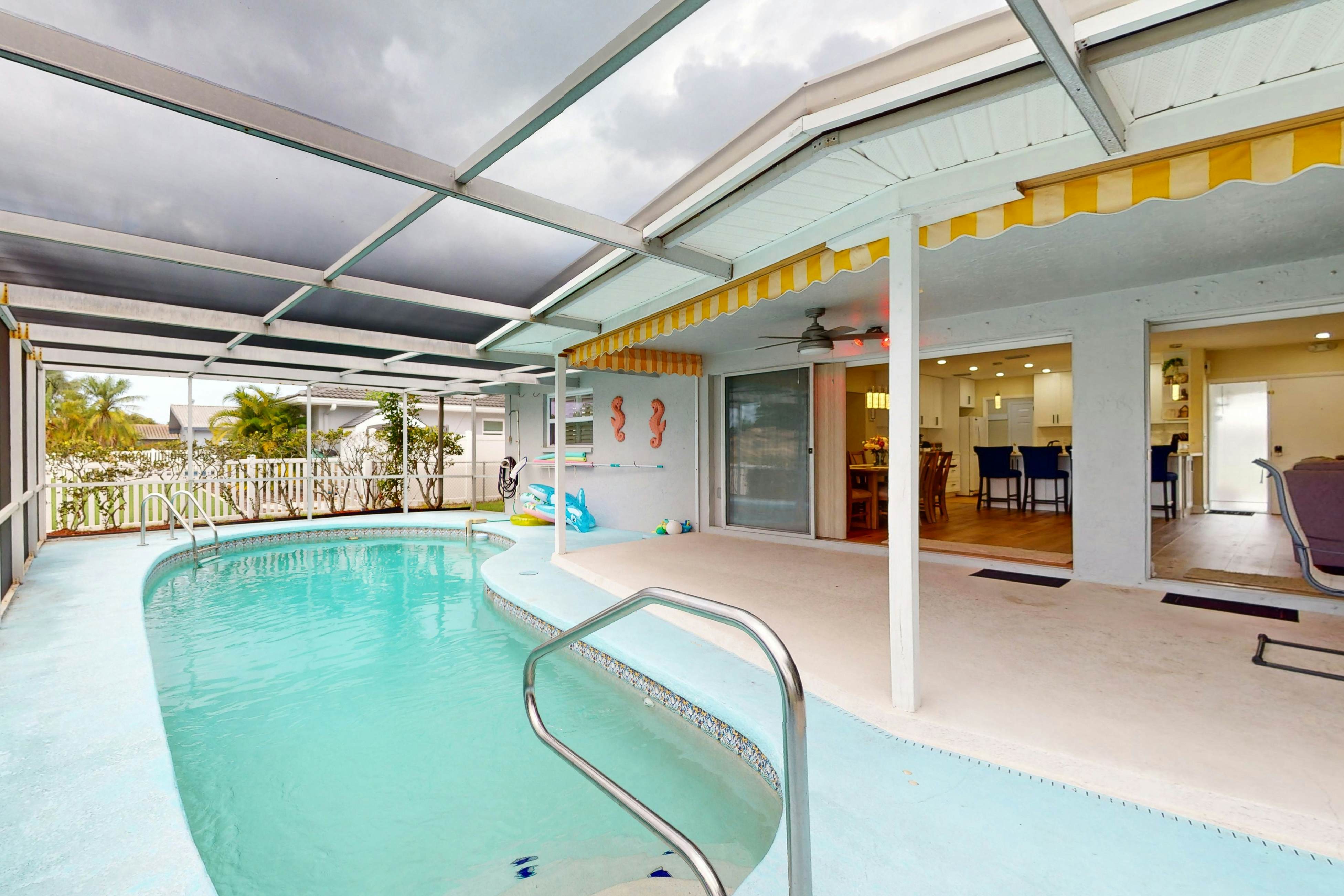 Canal-front home with private pool, dock, grill, canal views, & W/D