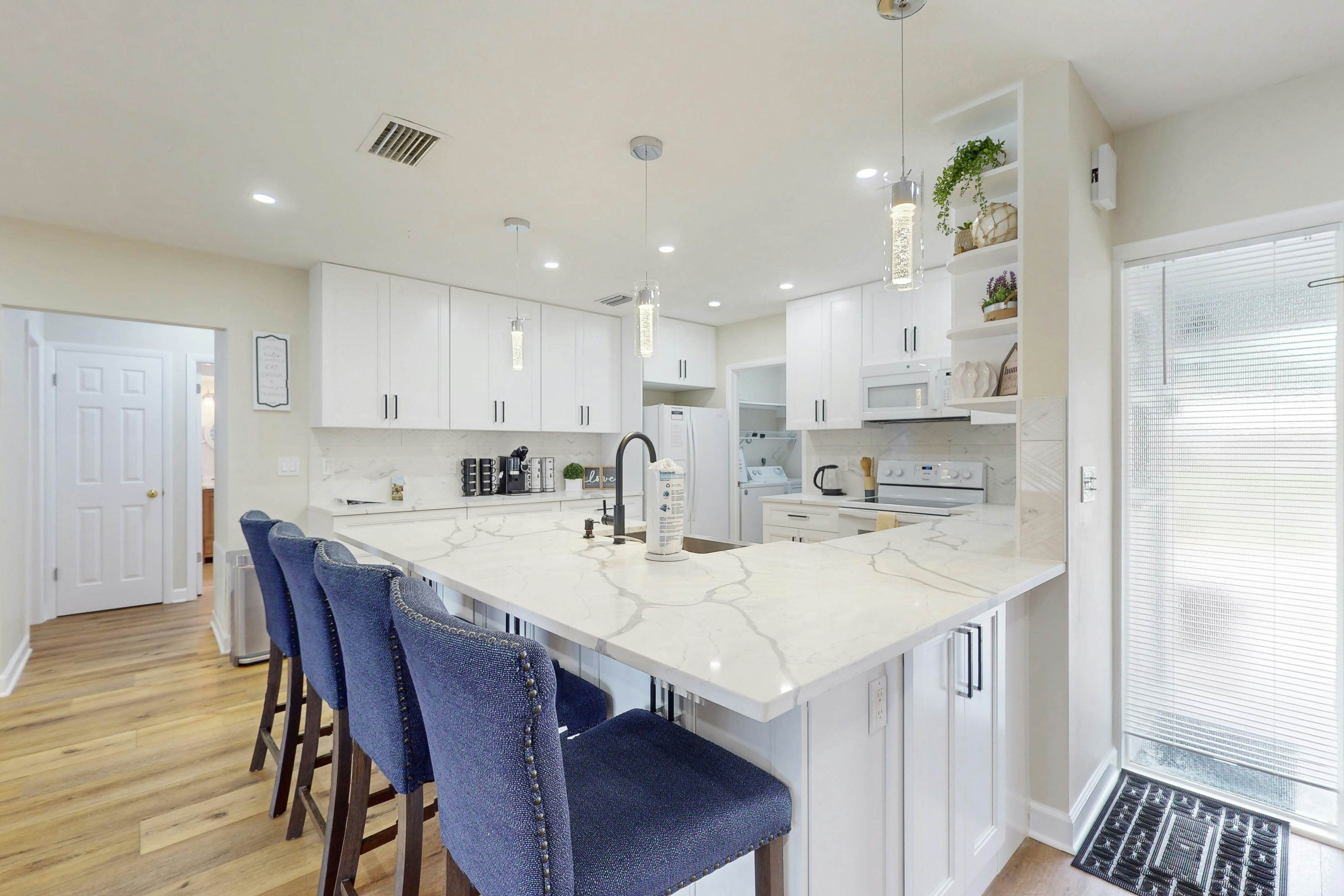 Canal-front home with private pool, dock, grill, canal views, & W/D