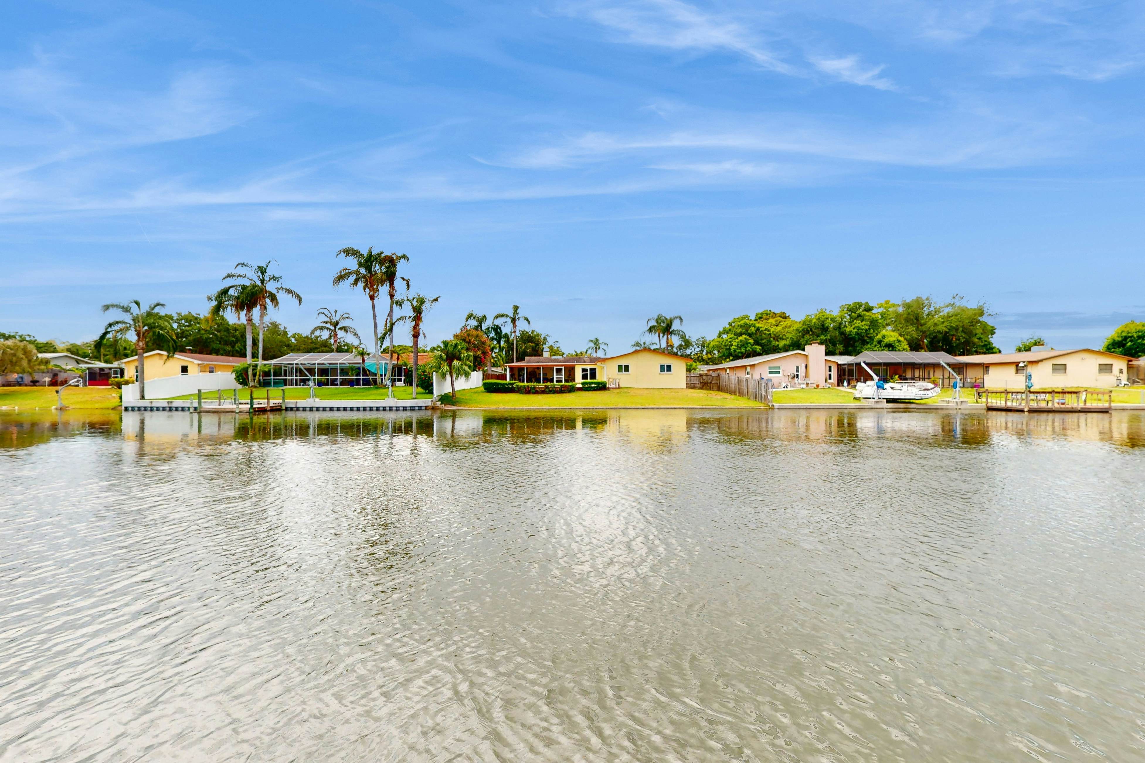 Canal-front home with private pool, dock, grill, canal views, & W/D