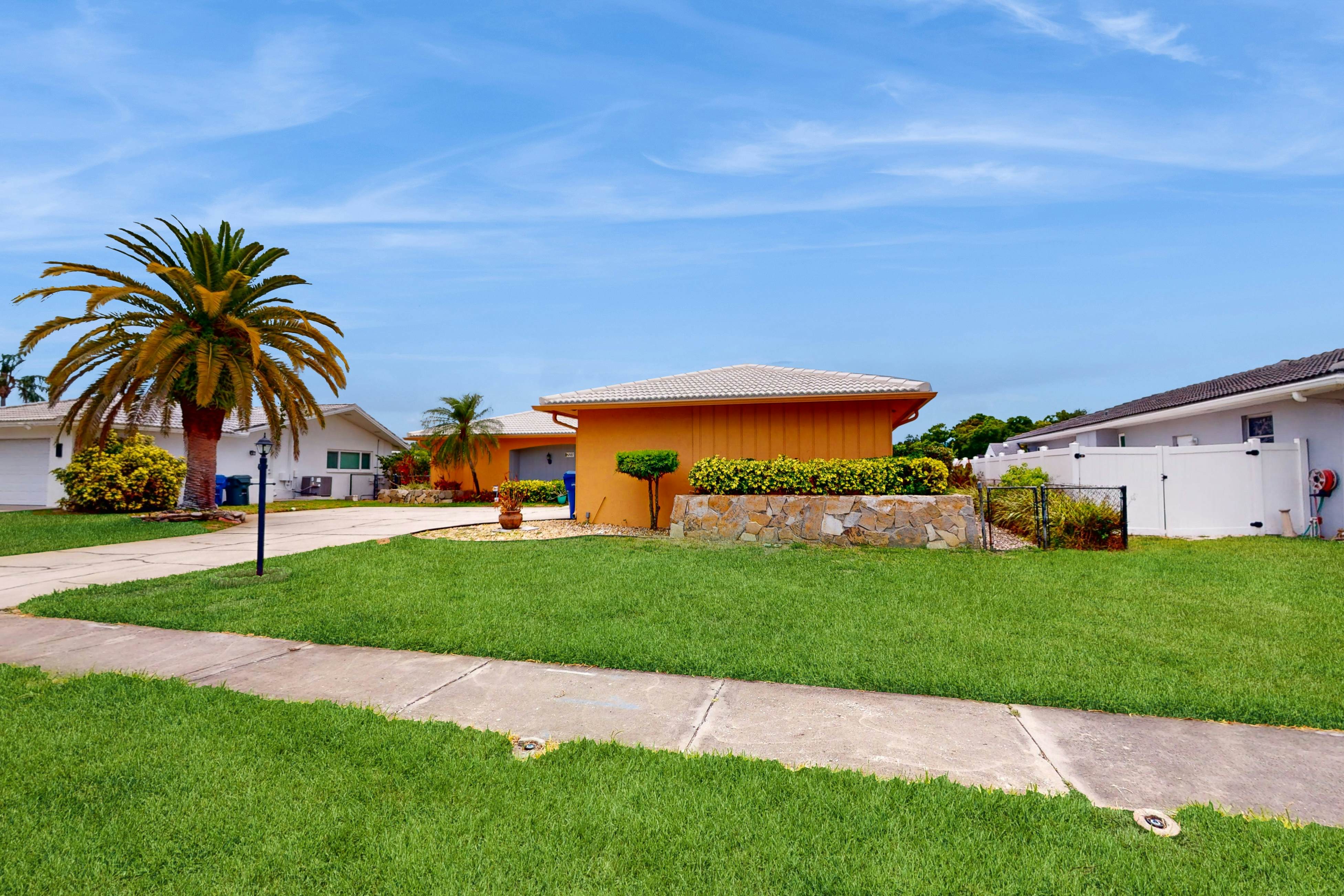 Canal-front home with private pool, dock, grill, canal views, & W/D