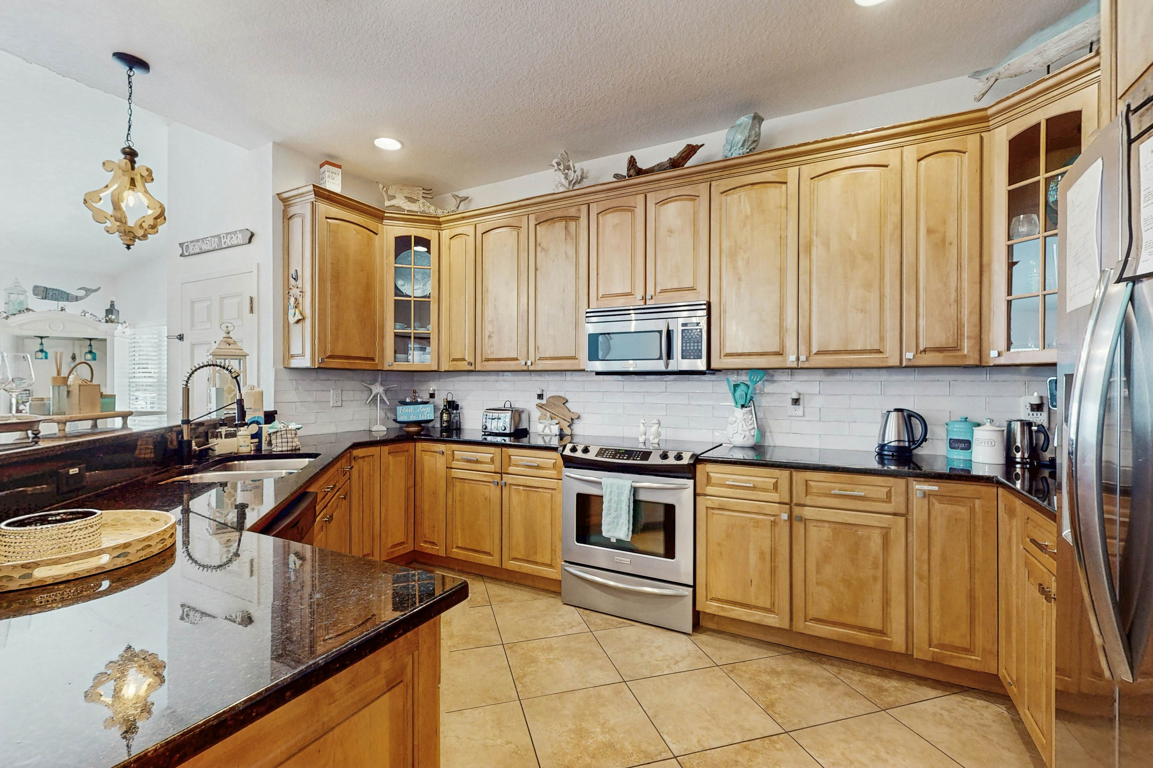 Steps to Gulf beaches, family friendly condo with water views, shared pool, AC