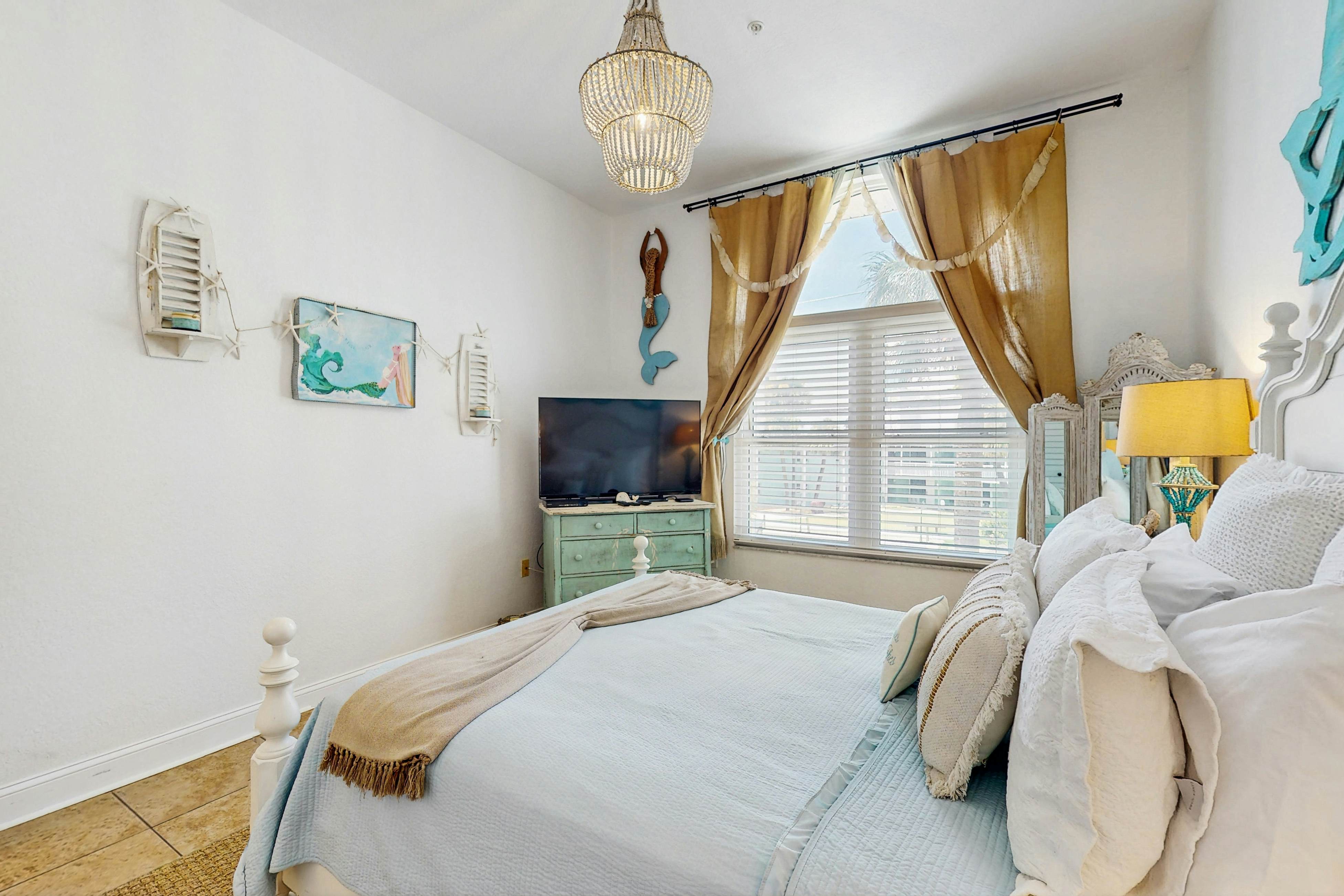 Steps to Gulf beaches, family friendly condo with water views, shared pool, AC