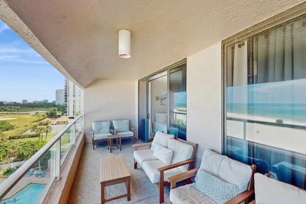 Beachfront condo with great views balcony heated pool sauna and hot tub