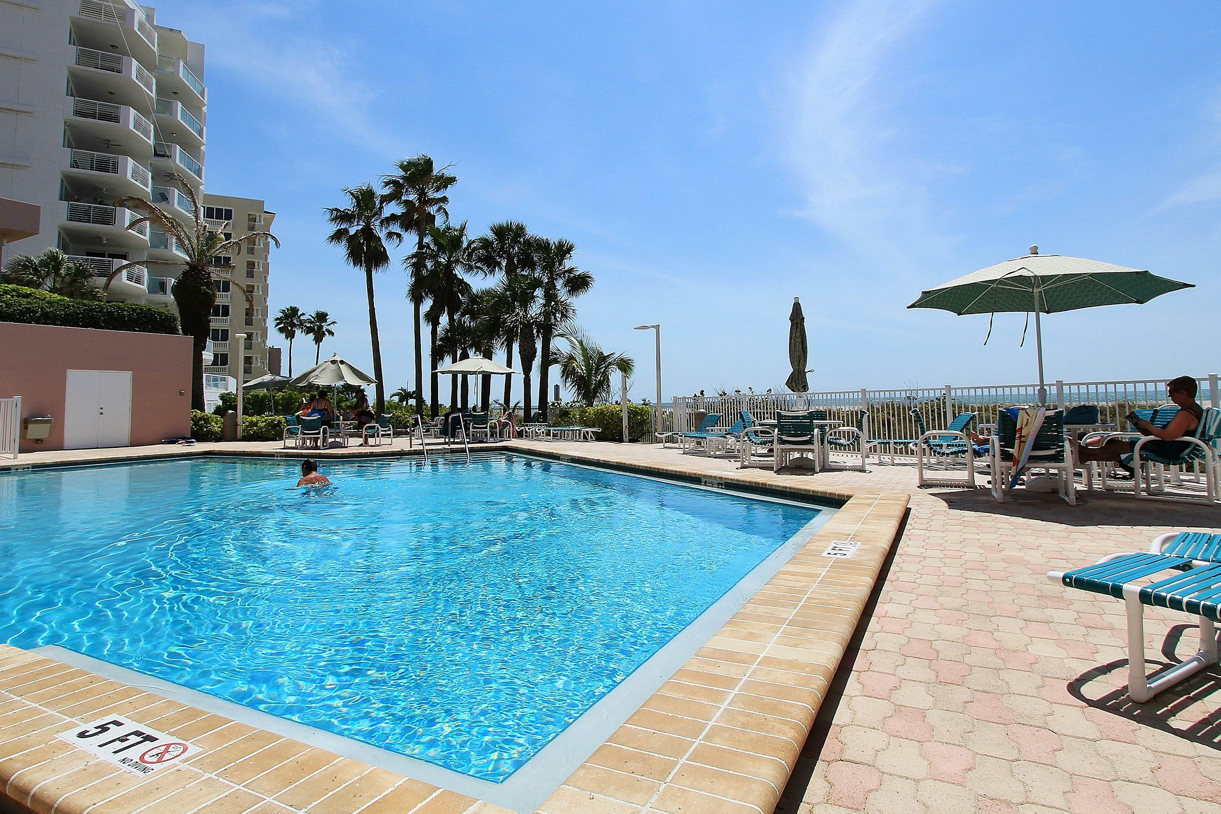 Beachfront condo with great views, balcony, heated pool, sauna & hot tub