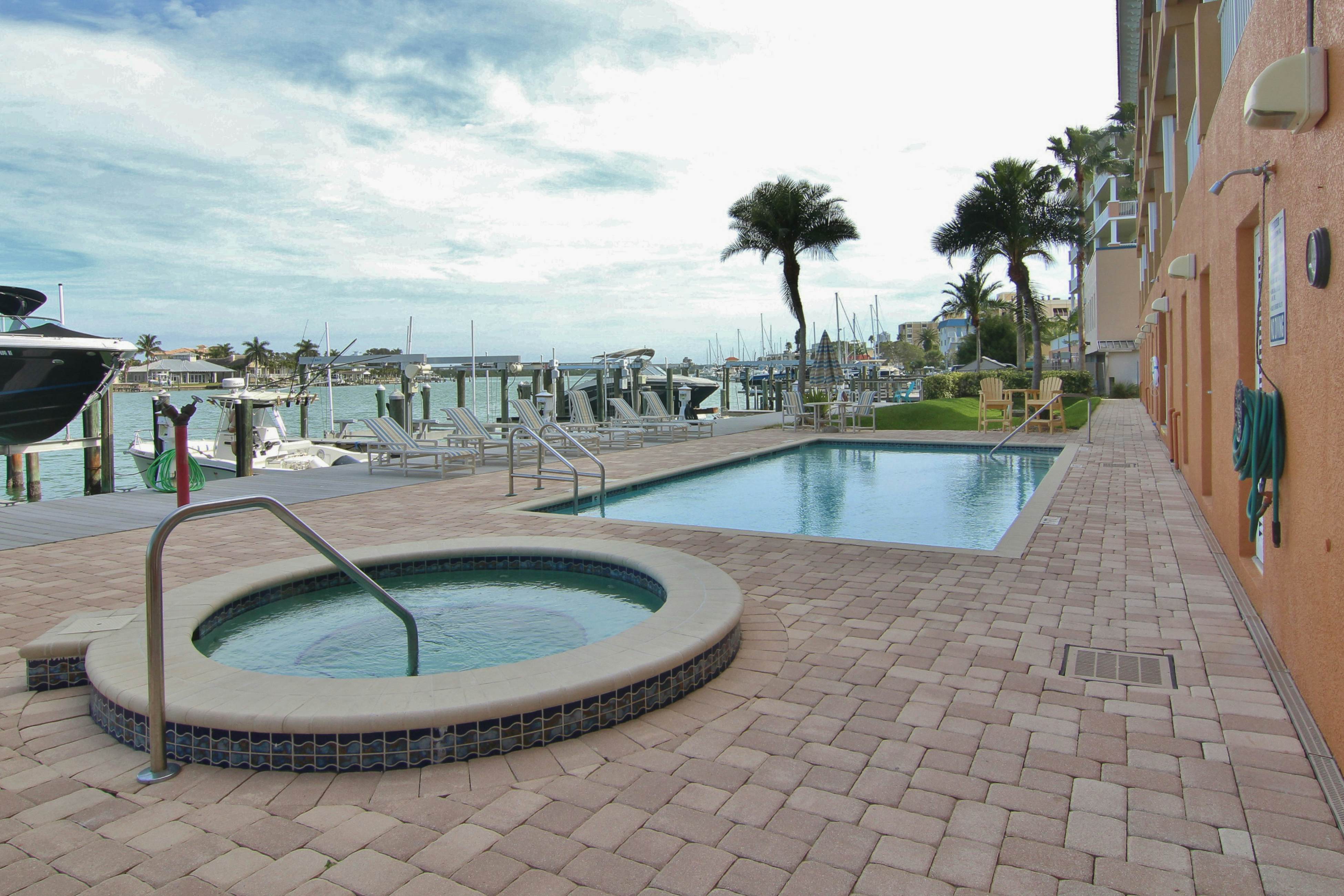 Upscale waterfront condo with heated pool & spa - walk to Clearwater Beach