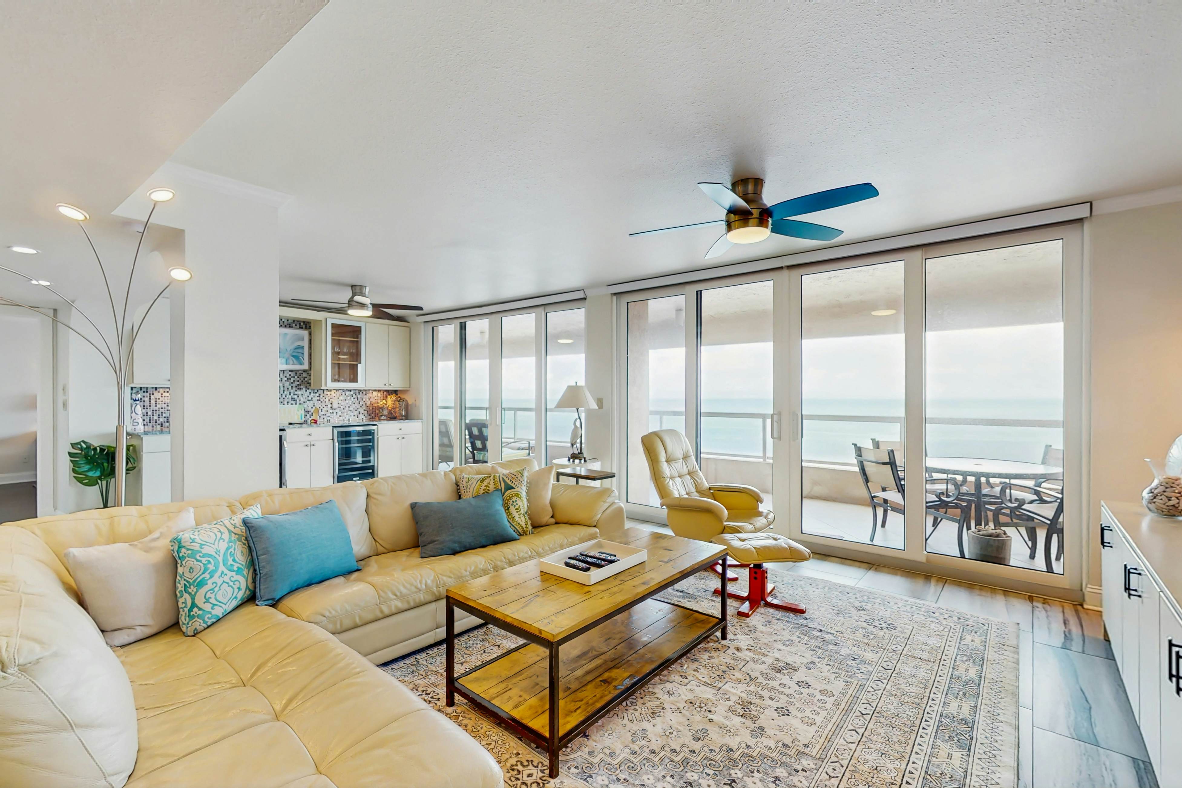 Luxe penthouse with balcony, sweeping views, heated pool, spa, hot tub & gym