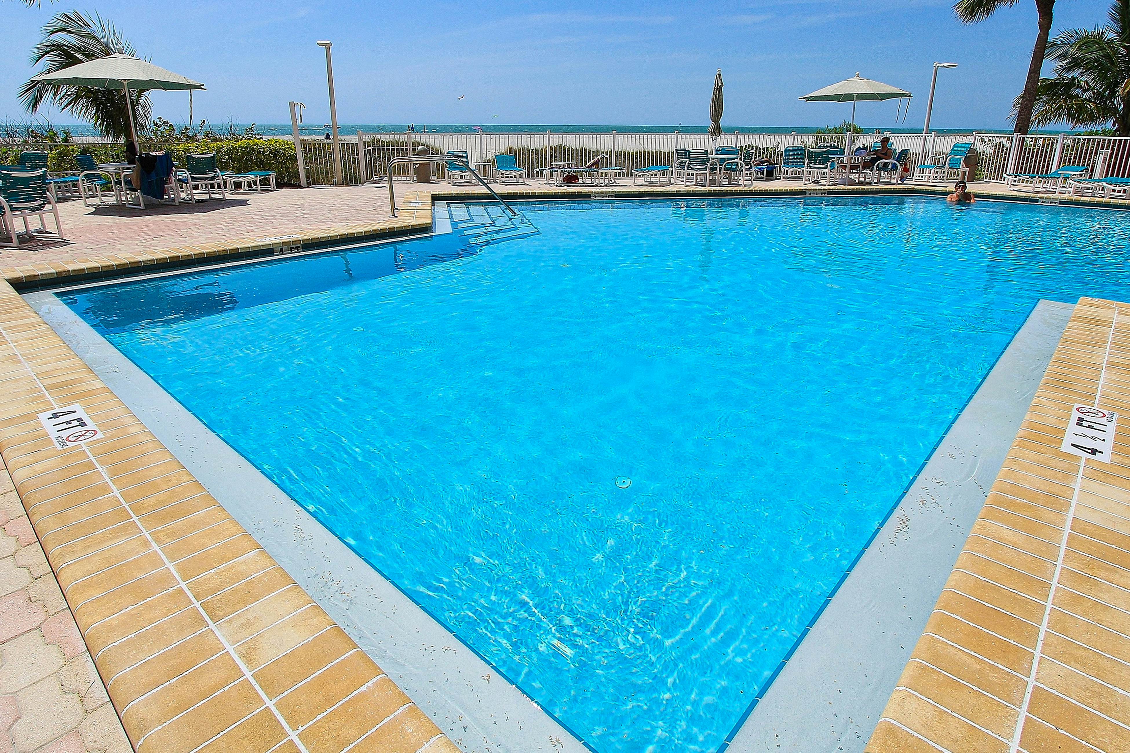 Luxe penthouse with balcony, sweeping views, heated pool, spa, hot tub & gym