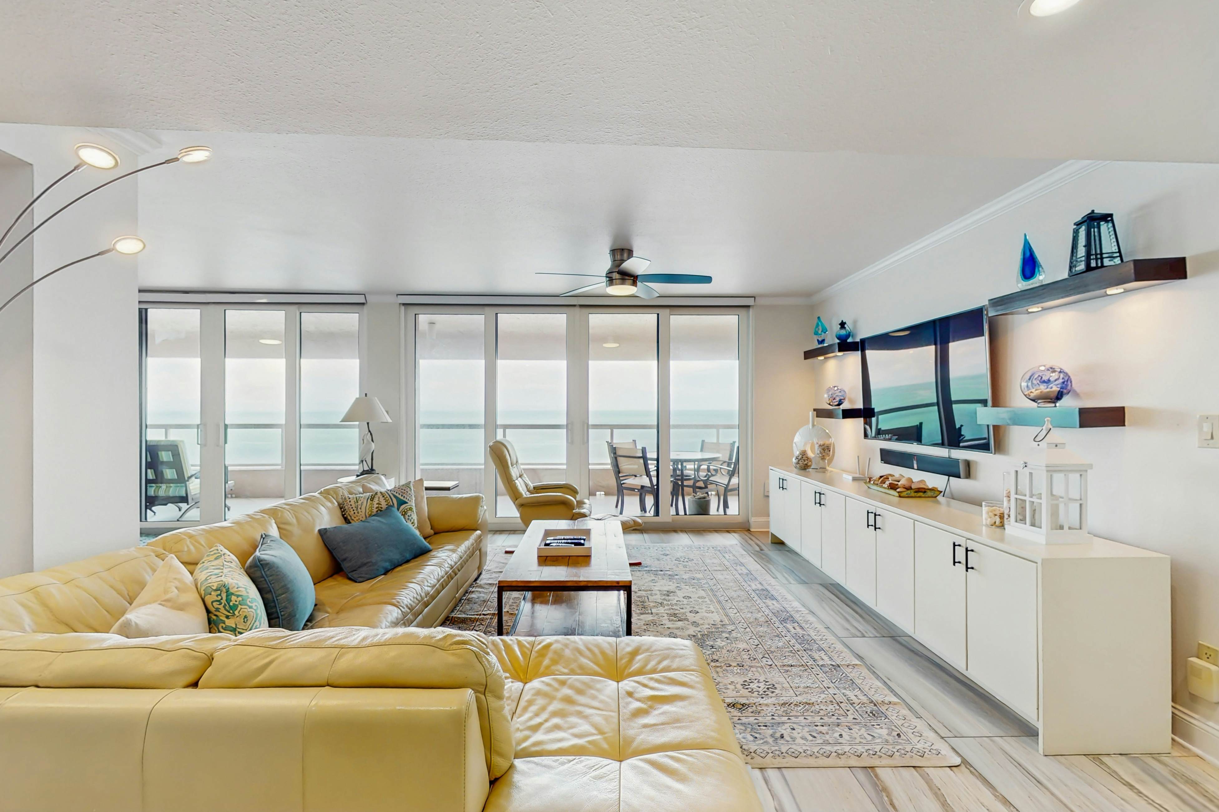 Luxe penthouse with balcony, sweeping views, heated pool, spa, hot tub & gym