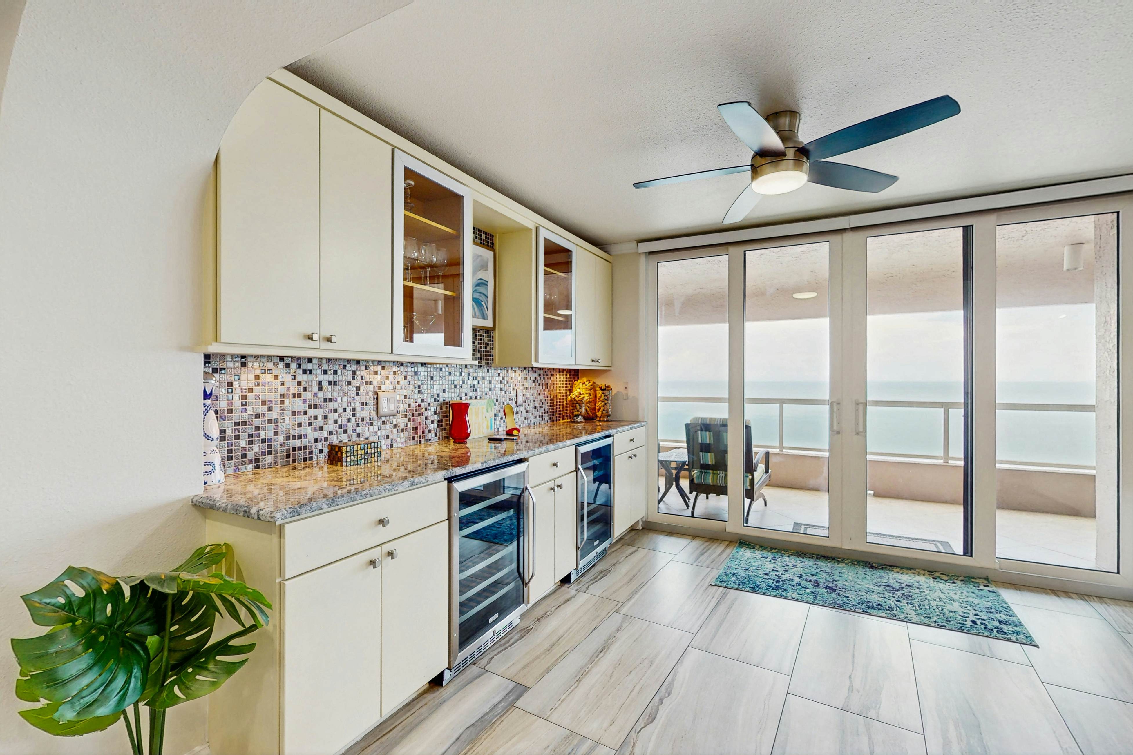 Luxe penthouse with balcony, sweeping views, heated pool, spa, hot tub & gym