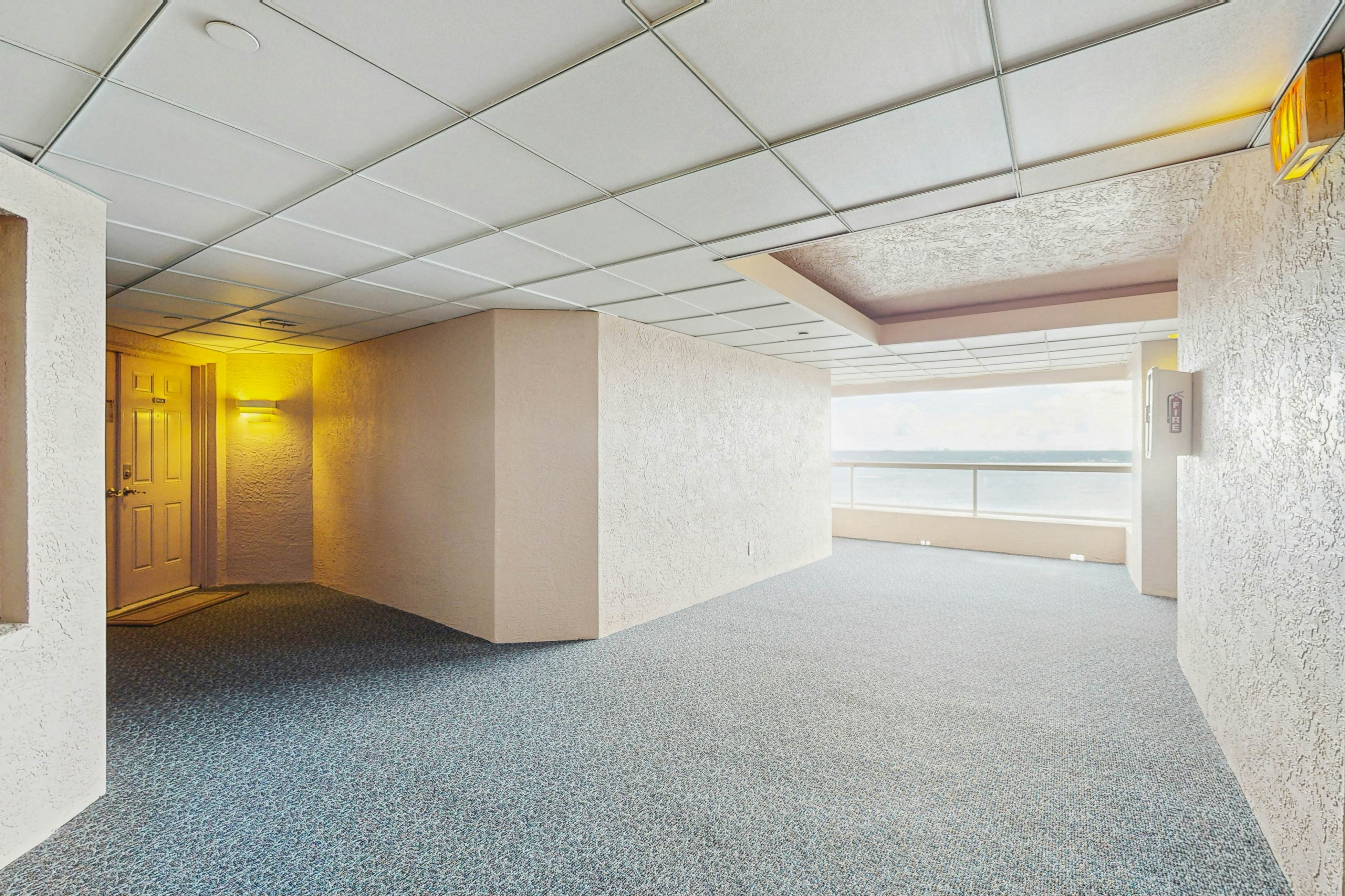 Luxe penthouse with balcony, sweeping views, heated pool, spa, hot tub & gym