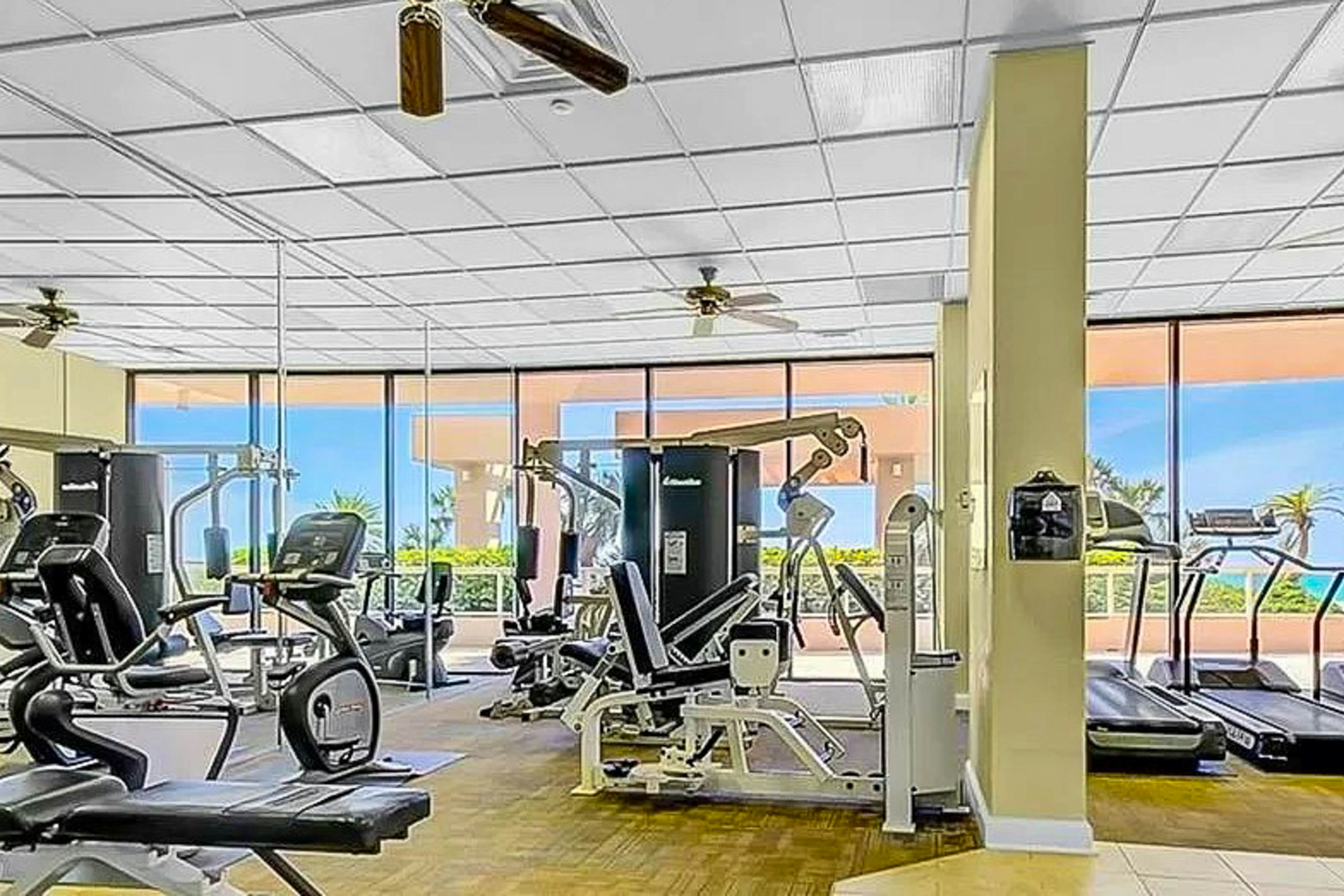 Luxe penthouse with balcony, sweeping views, heated pool, spa, hot tub & gym