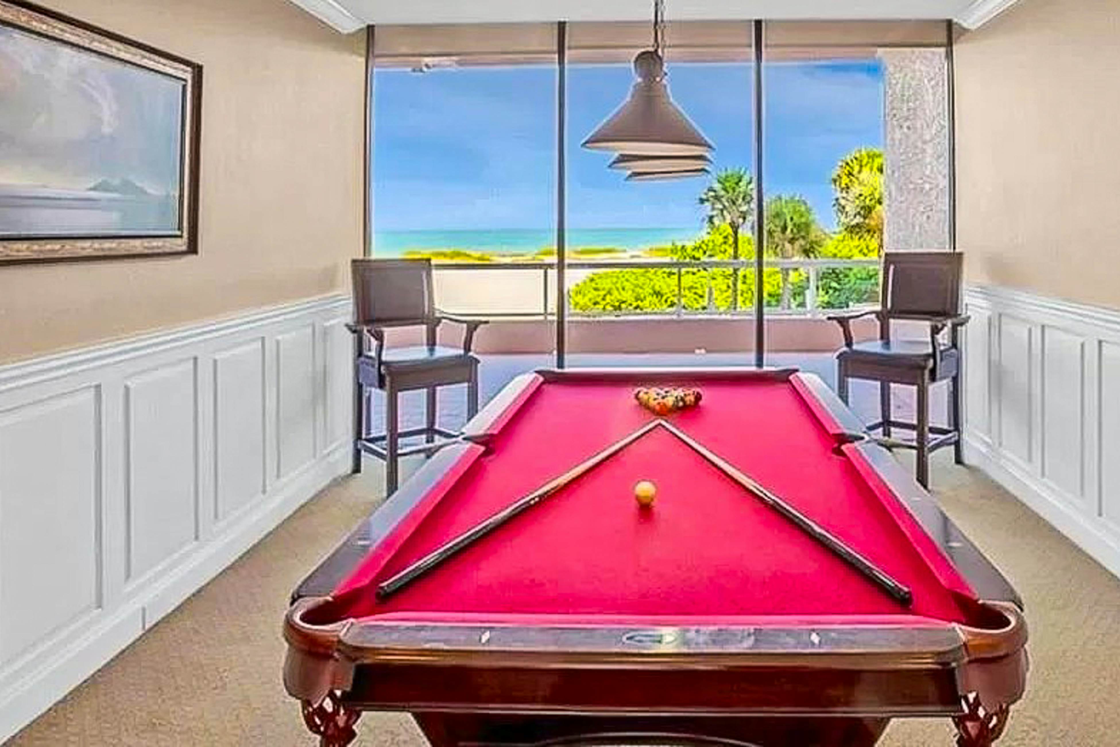 Luxe penthouse with balcony, sweeping views, heated pool, spa, hot tub & gym