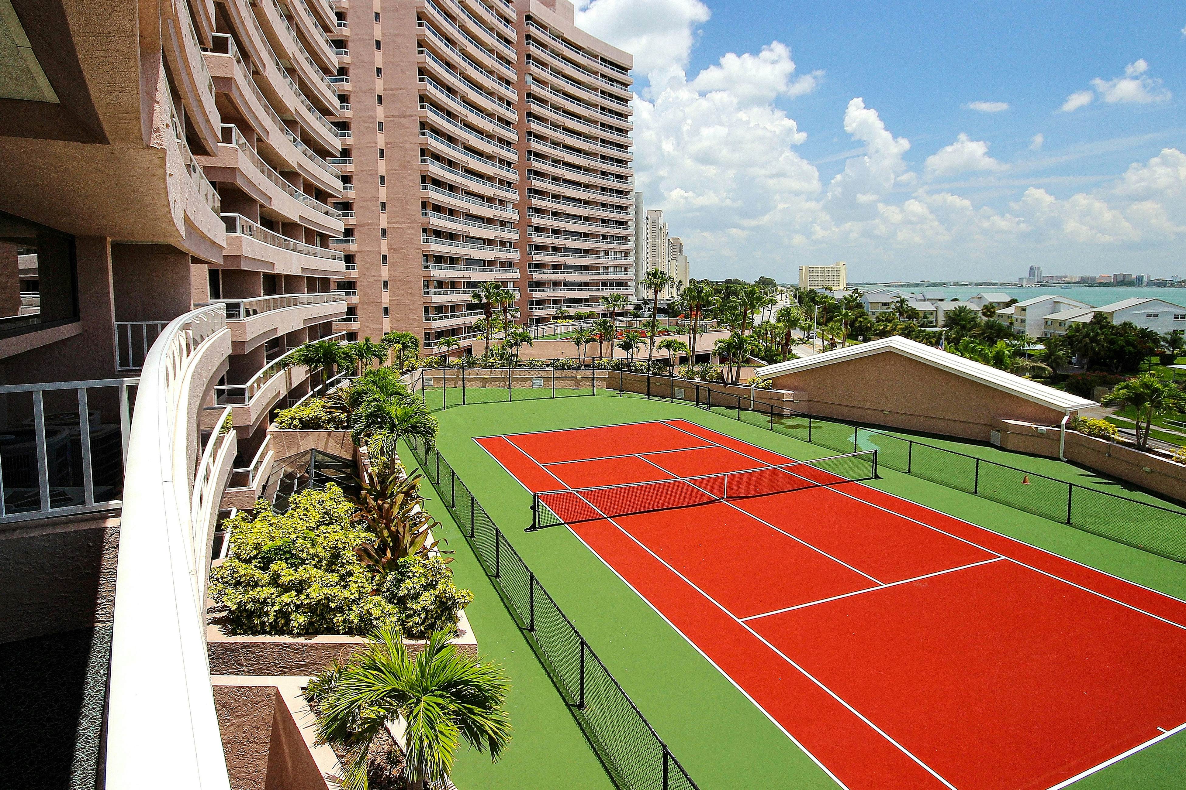 Luxe penthouse with balcony, sweeping views, heated pool, spa, hot tub & gym