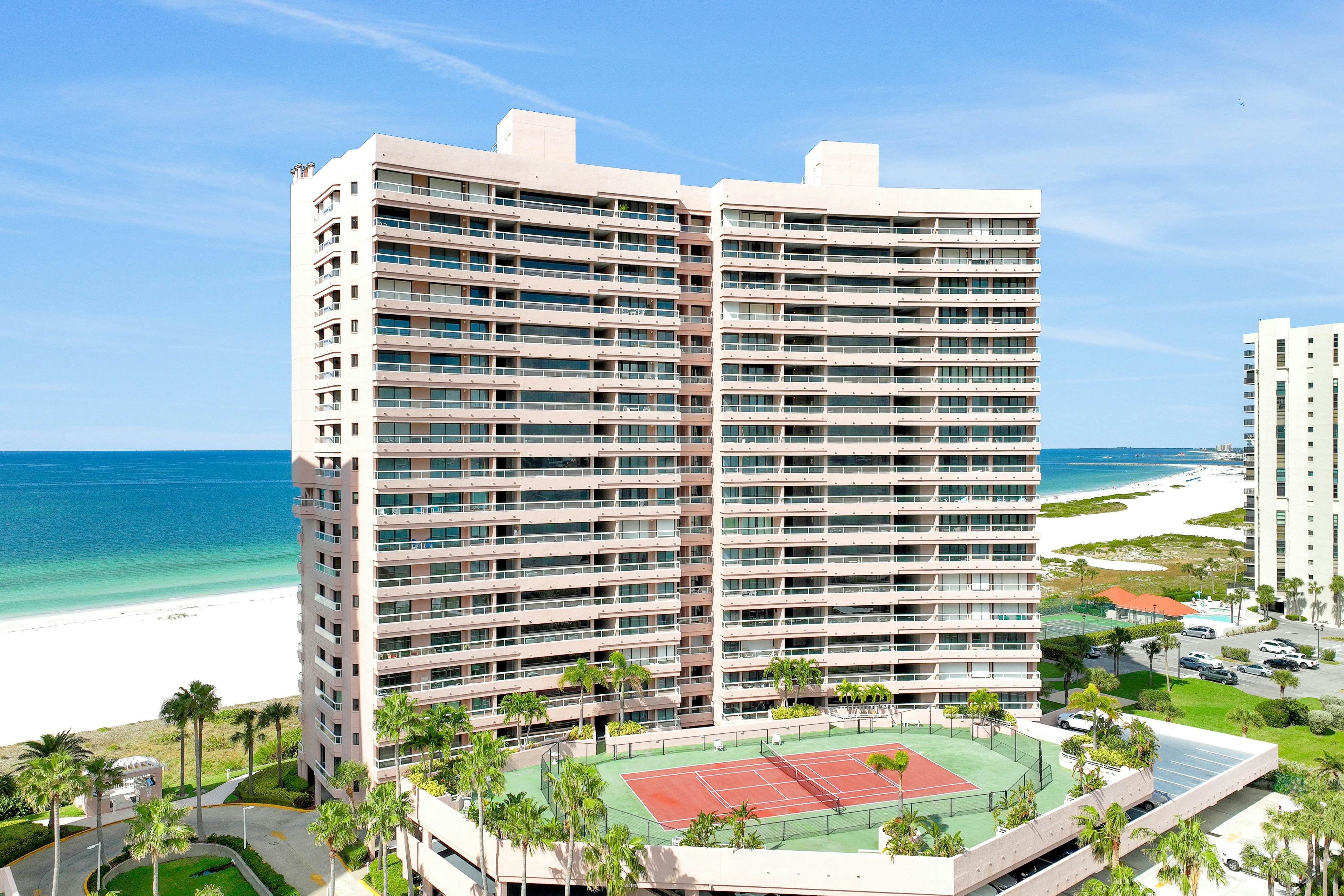 Luxe penthouse with balcony, sweeping views, heated pool, spa, hot tub & gym