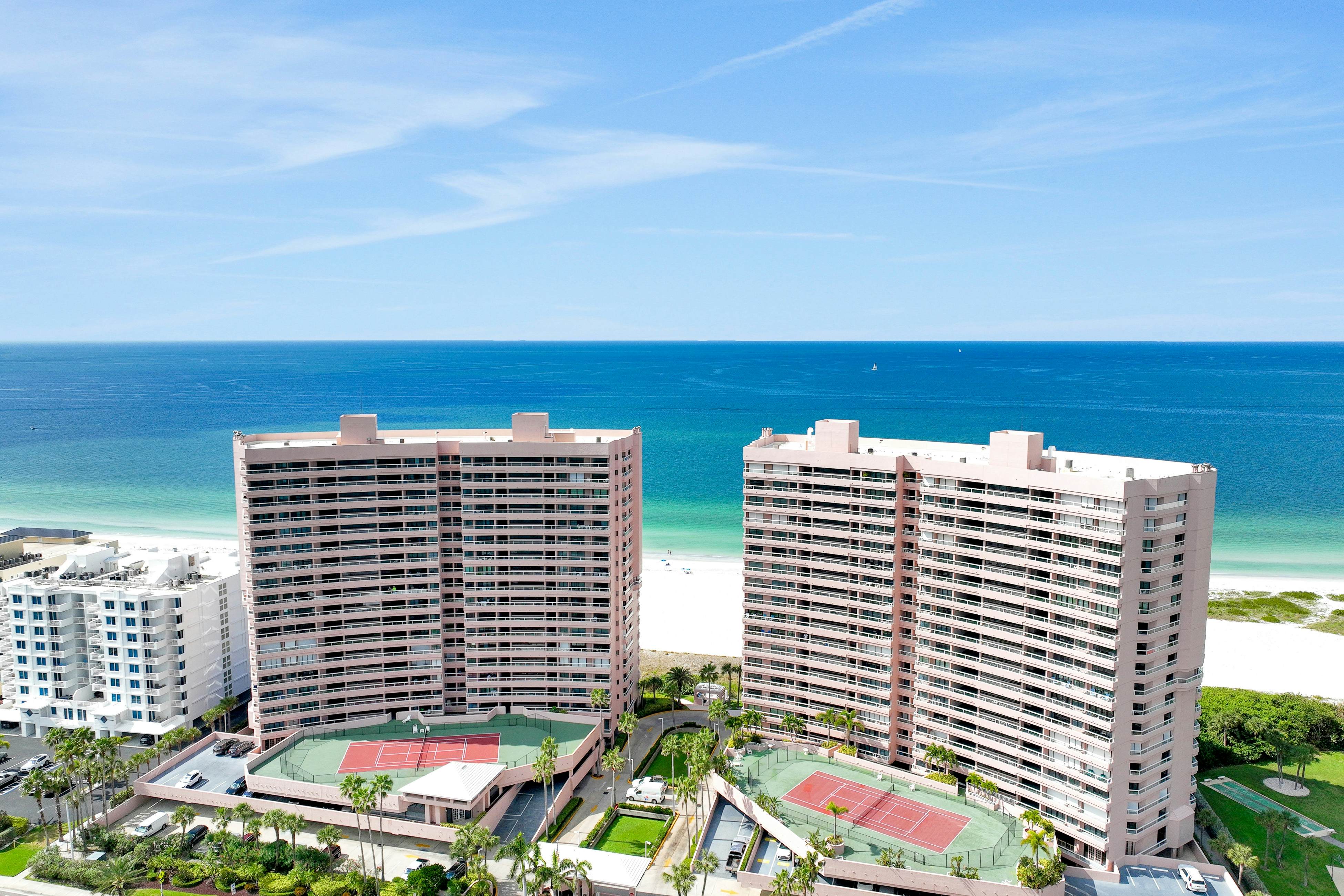 Luxe penthouse with balcony, sweeping views, heated pool, spa, hot tub & gym