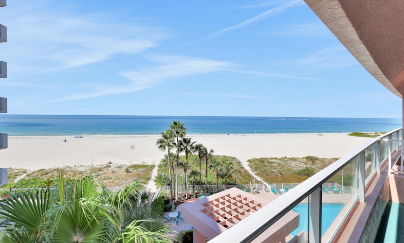 Beachfront condo with multiple balconies heated pool gym hot tub and AC